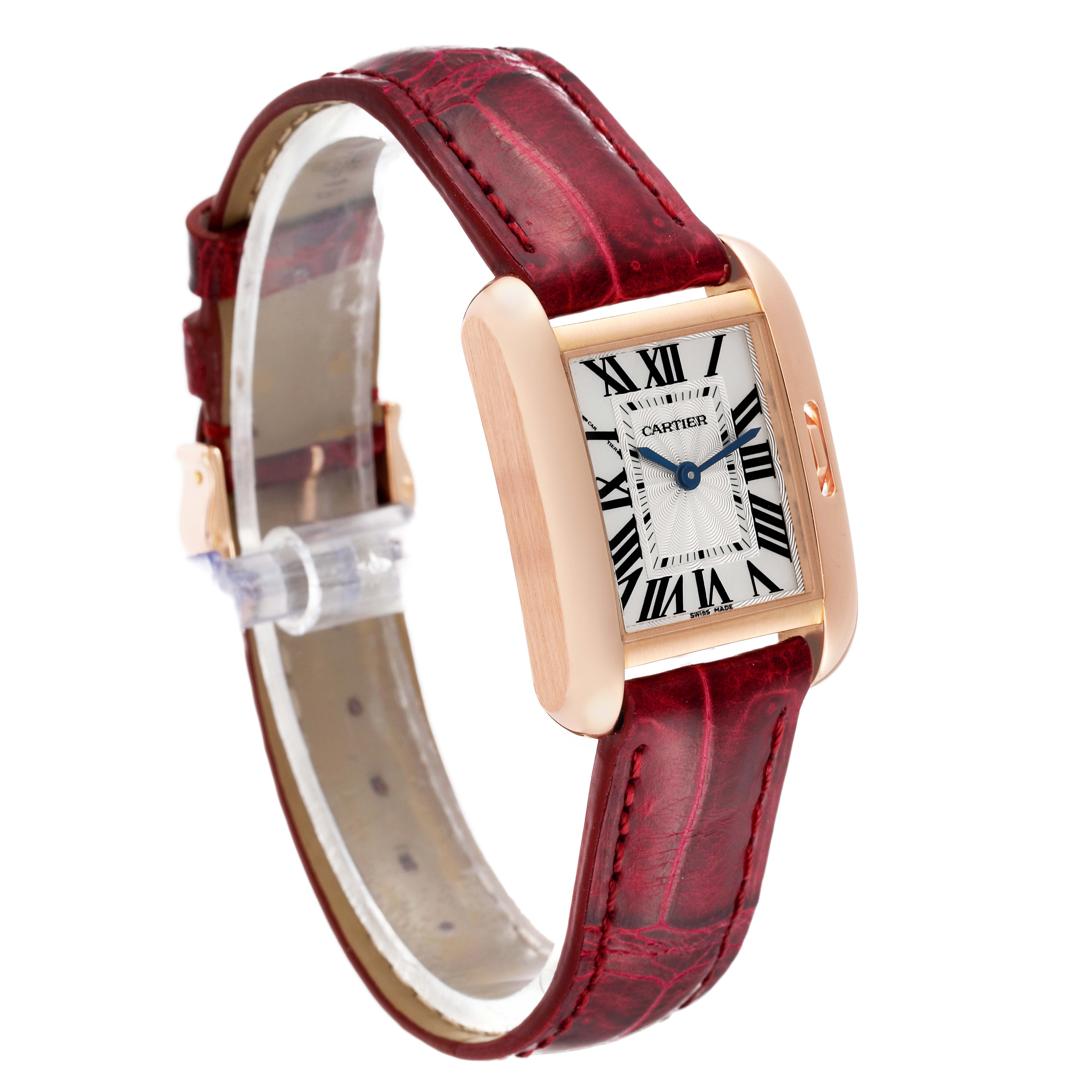 The image shows a Cartier Tank Anglaise W5310027 Women
s Rose Gold Silver Dial W5310027 Women
s Rose Gold Silver Dial watch at a slight angle, highlighting its face and red leather strap.