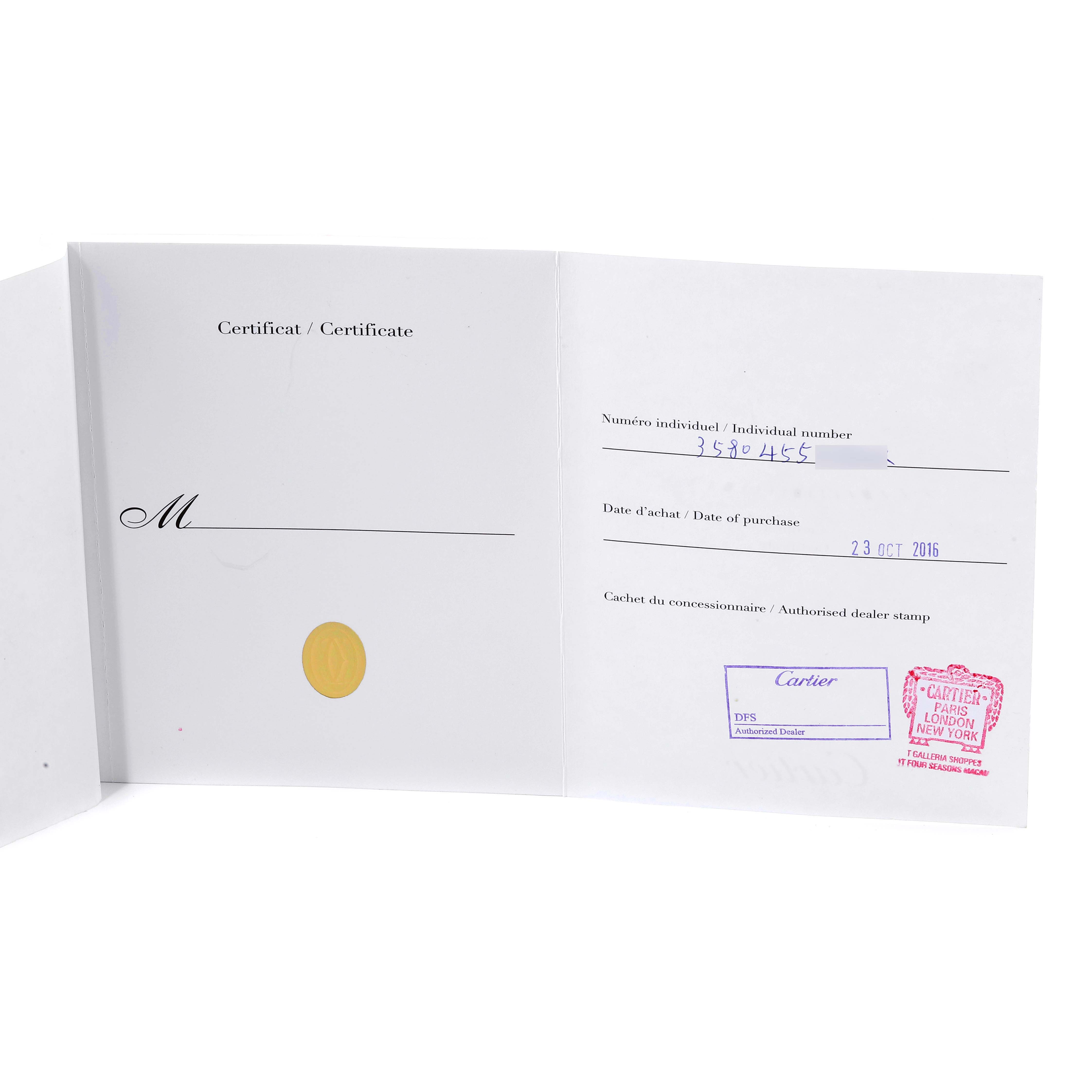 The image shows the warranty certificate for a Tank Anglaise model by Cartier, opened to display purchase details and dealer stamps.