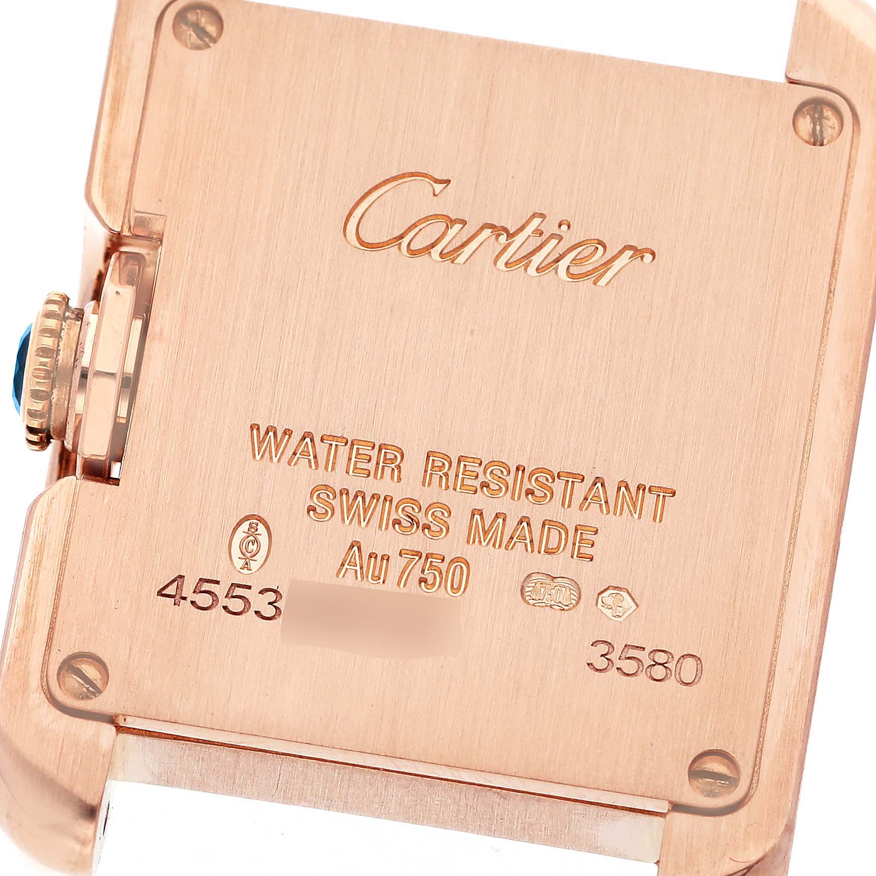 This is a close-up view of the back of a Cartier Tank Anglaise W5310027 Women
s Rose Gold Silver Dial W5310027 Women
s Rose Gold Silver Dial watch, showcasing its markings and crown.