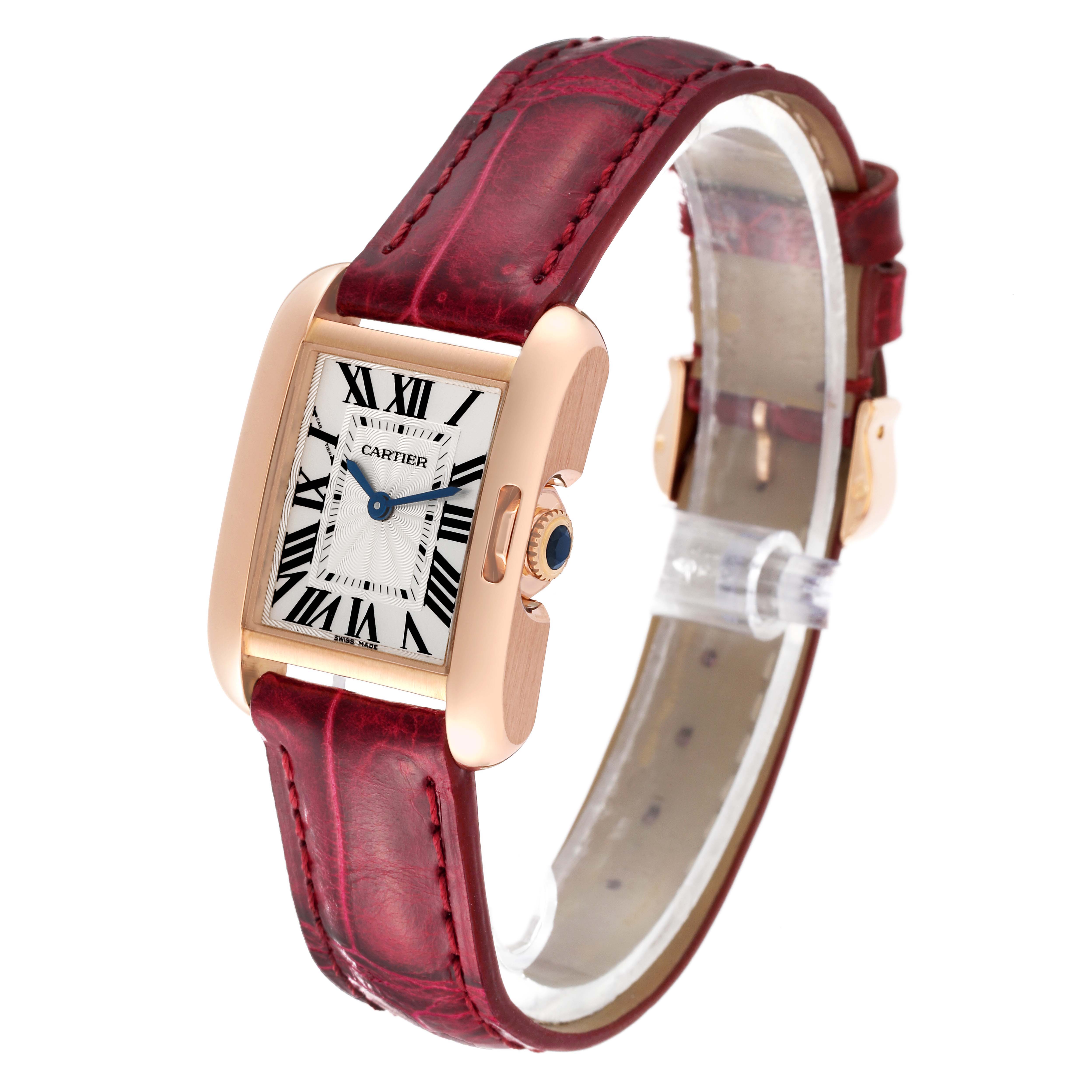 This Cartier Tank Anglaise W5310027 Women
s Rose Gold Silver Dial W5310027 Women
s Rose Gold Silver Dial watch is shown at a front angle, highlighting its rose gold case, leather strap, and Roman numeral dial.