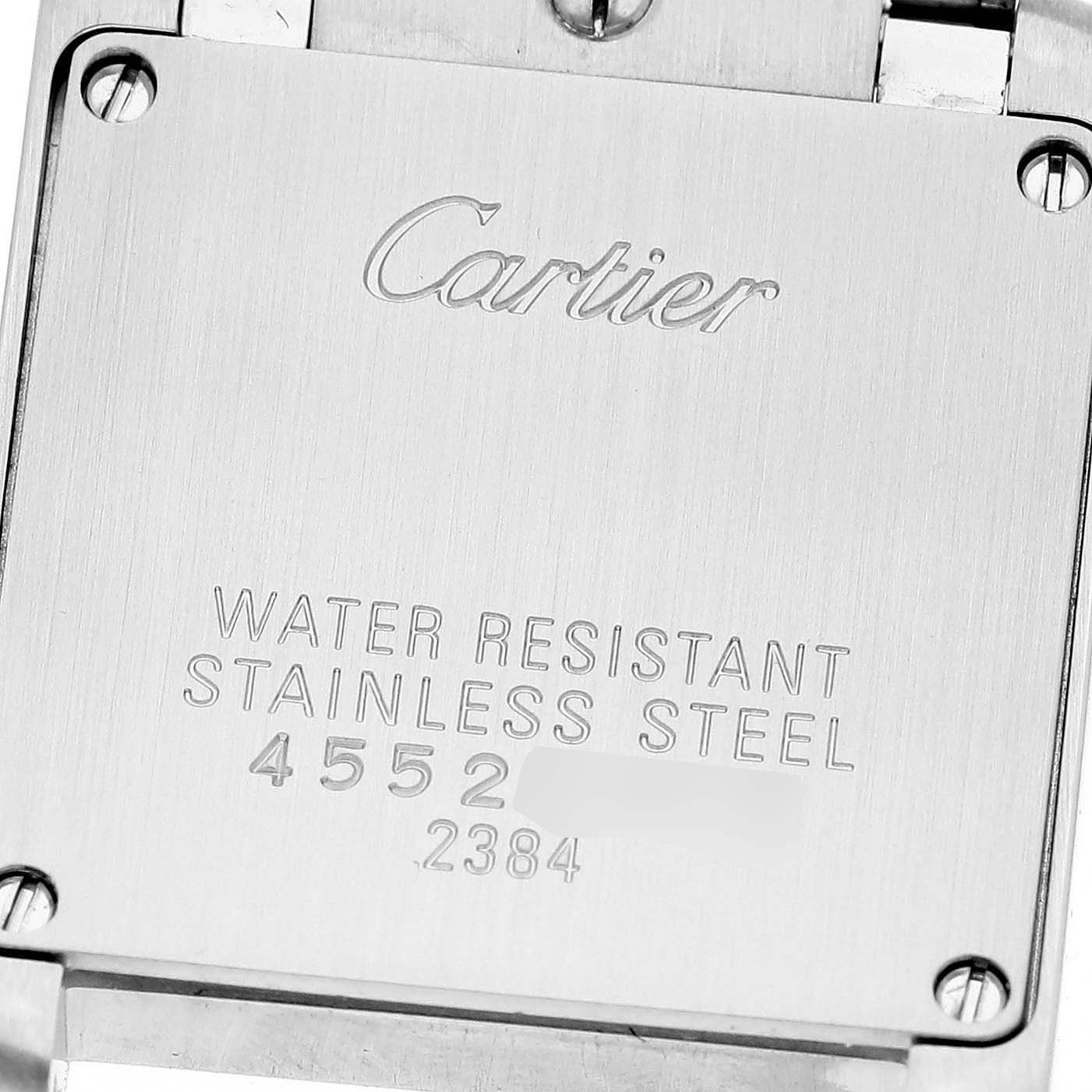 This image shows the back plate of a Cartier Tank Francaise W51026Q3 Women's Stainless Steel Black Dial W51026Q3 Women's Stainless Steel Black Dial watch, displaying its brand, water resistance, and model number.