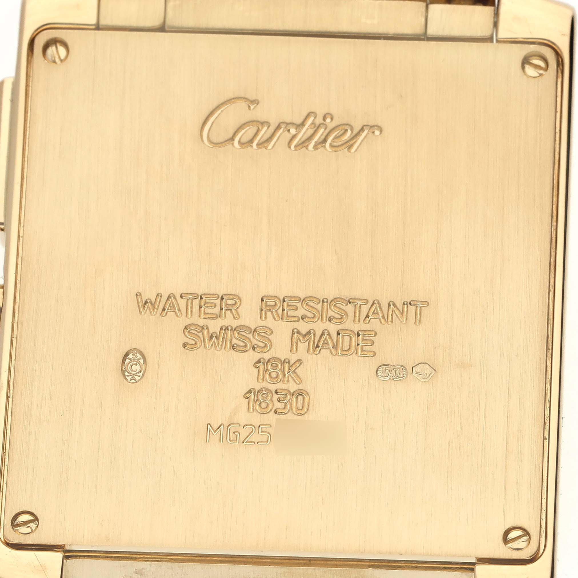 The image shows the back of the Cartier Tank Française watch, highlighting engravings and markings.