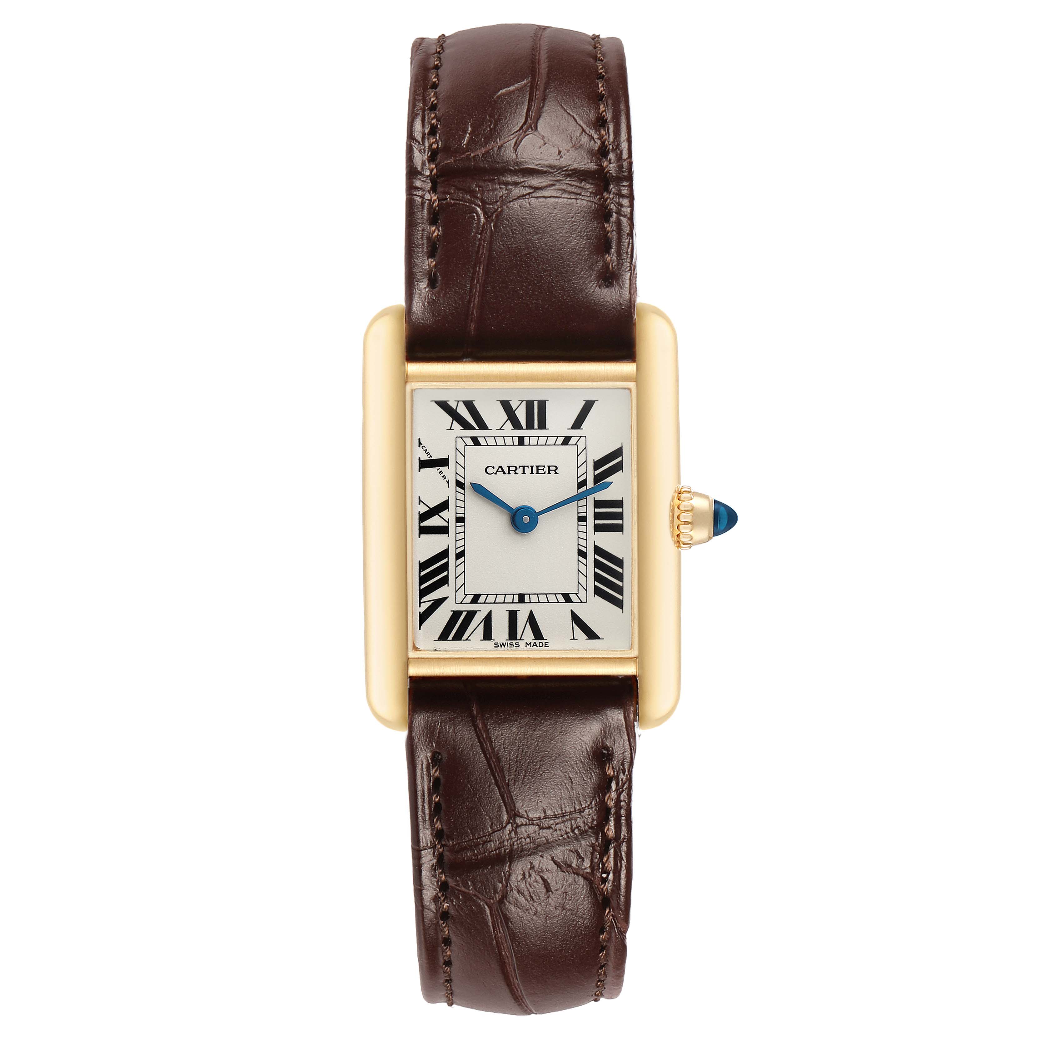 The Cartier Tank Louis W1529856 Women's Yellow Gold Silver Dial watch is shown from a top-down angle, highlighting the rectangular face, Roman numerals, and leather strap.