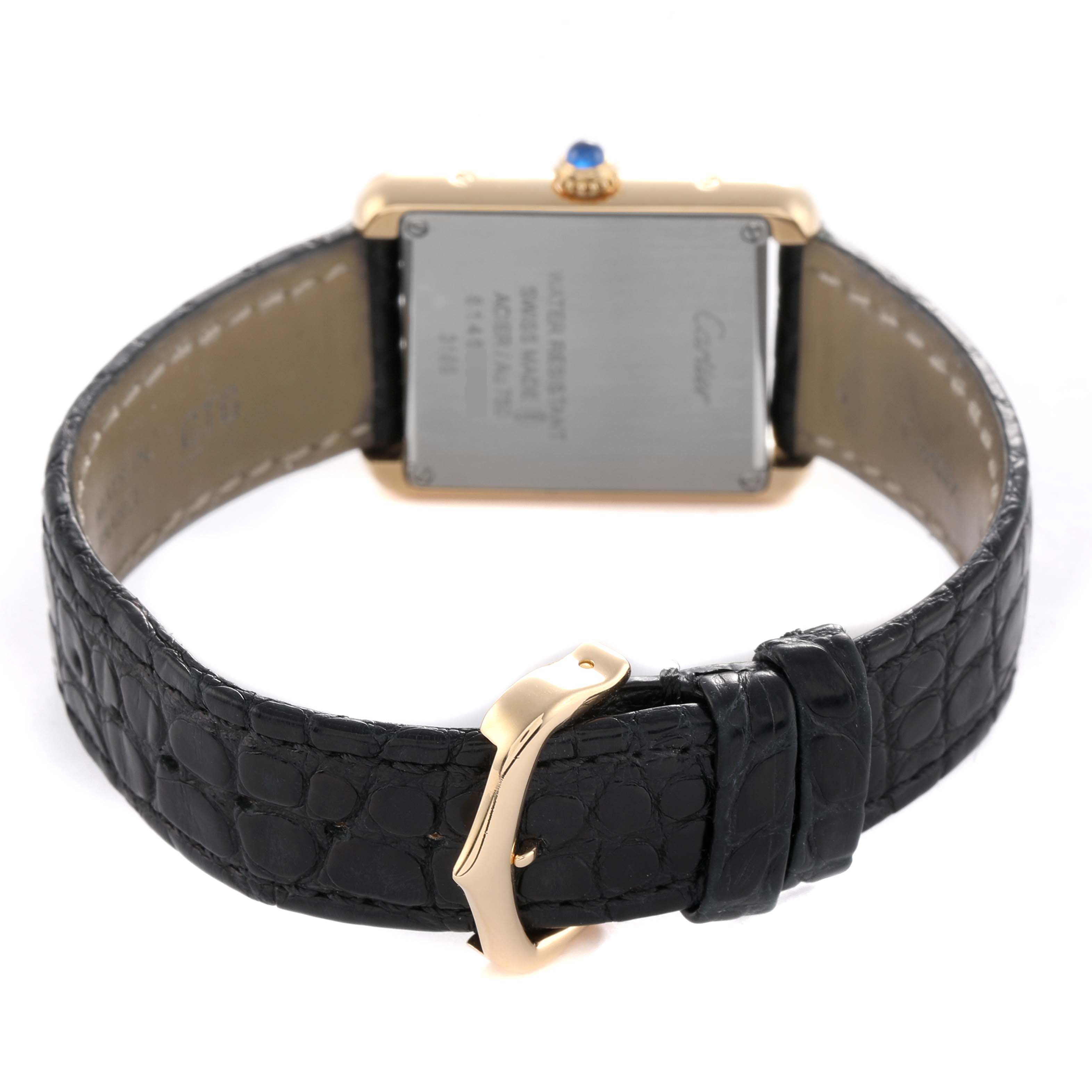 The Cartier Tank Solo W5200002 Women's Yellow Gold Silver Dial watch is shown from the back, displaying the clasp, leather strap, and case back with crown detail.