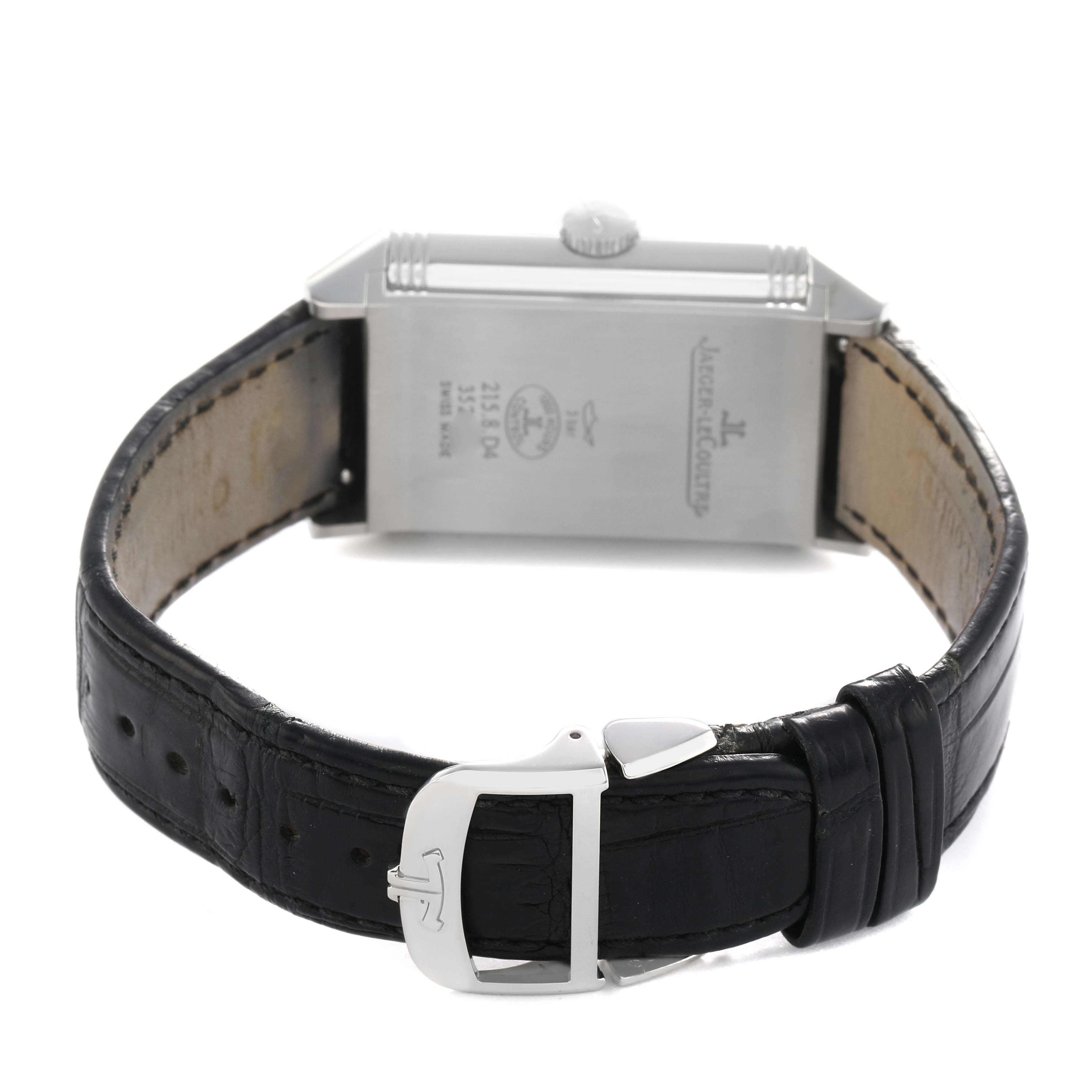 The image shows the back of a Jaeger LeCoultre Reverso Q3848420 Men's Stainless Steel Silver Dial watch, highlighting the case back, crown, and black leather strap with clasp.