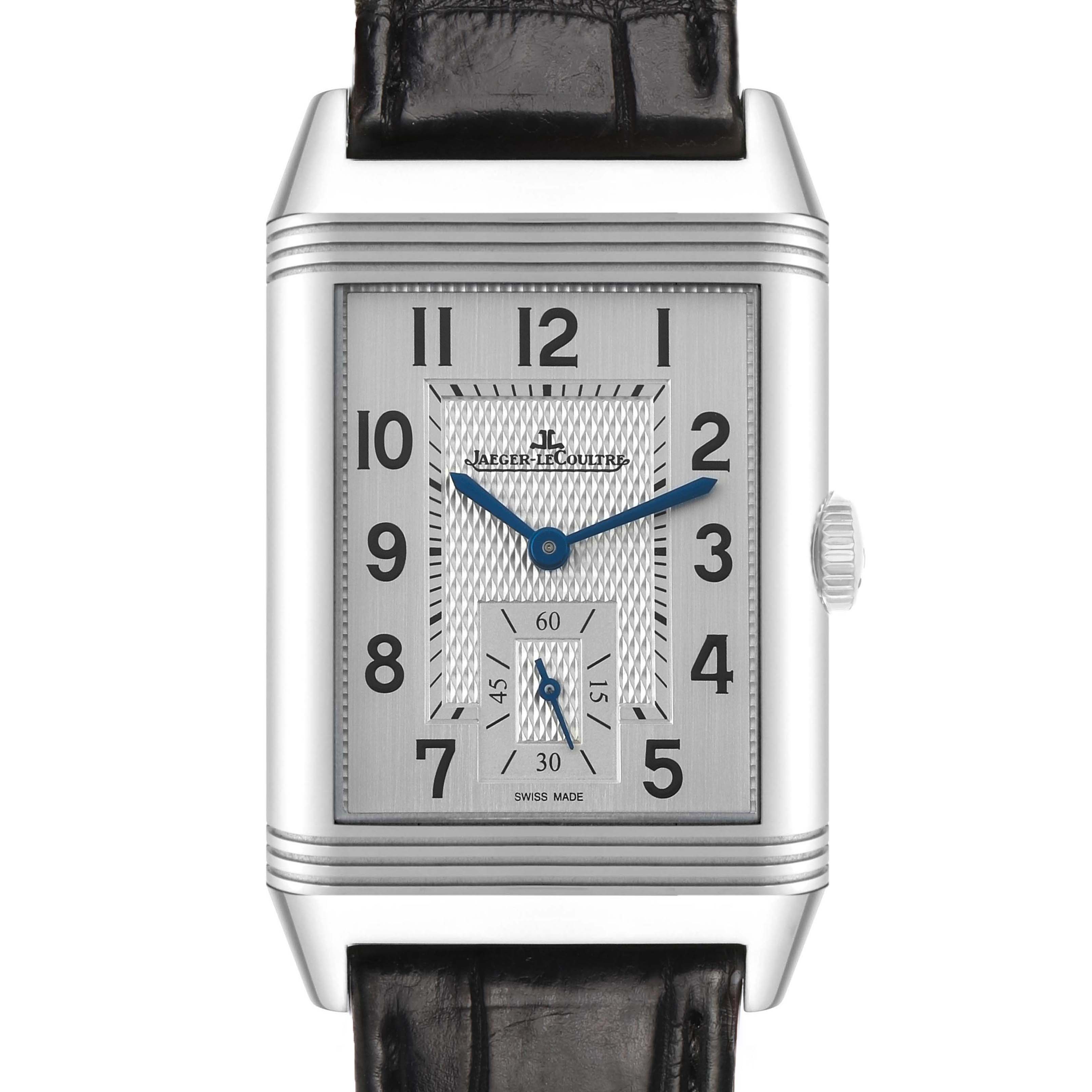 The Jaeger LeCoultre Reverso Q3848420 Men's Stainless Steel Silver Dial watch is shown from a front angle, displaying its rectangular face and side crown.