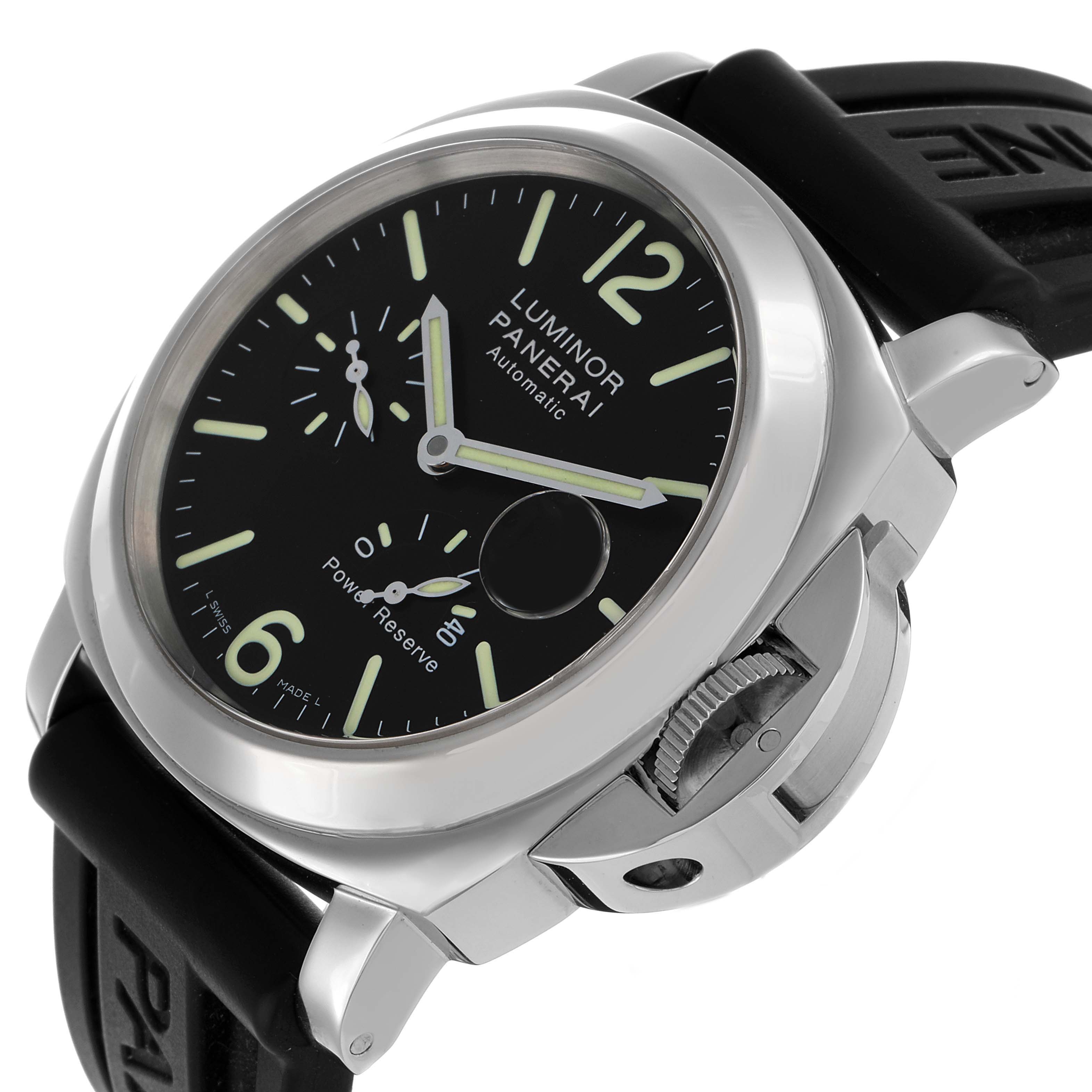 The Panerai Luminor PAM00090 Men's Stainless Steel Black Dial watch is shown at an oblique angle, highlighting the dial, crown guard, and rubber strap.