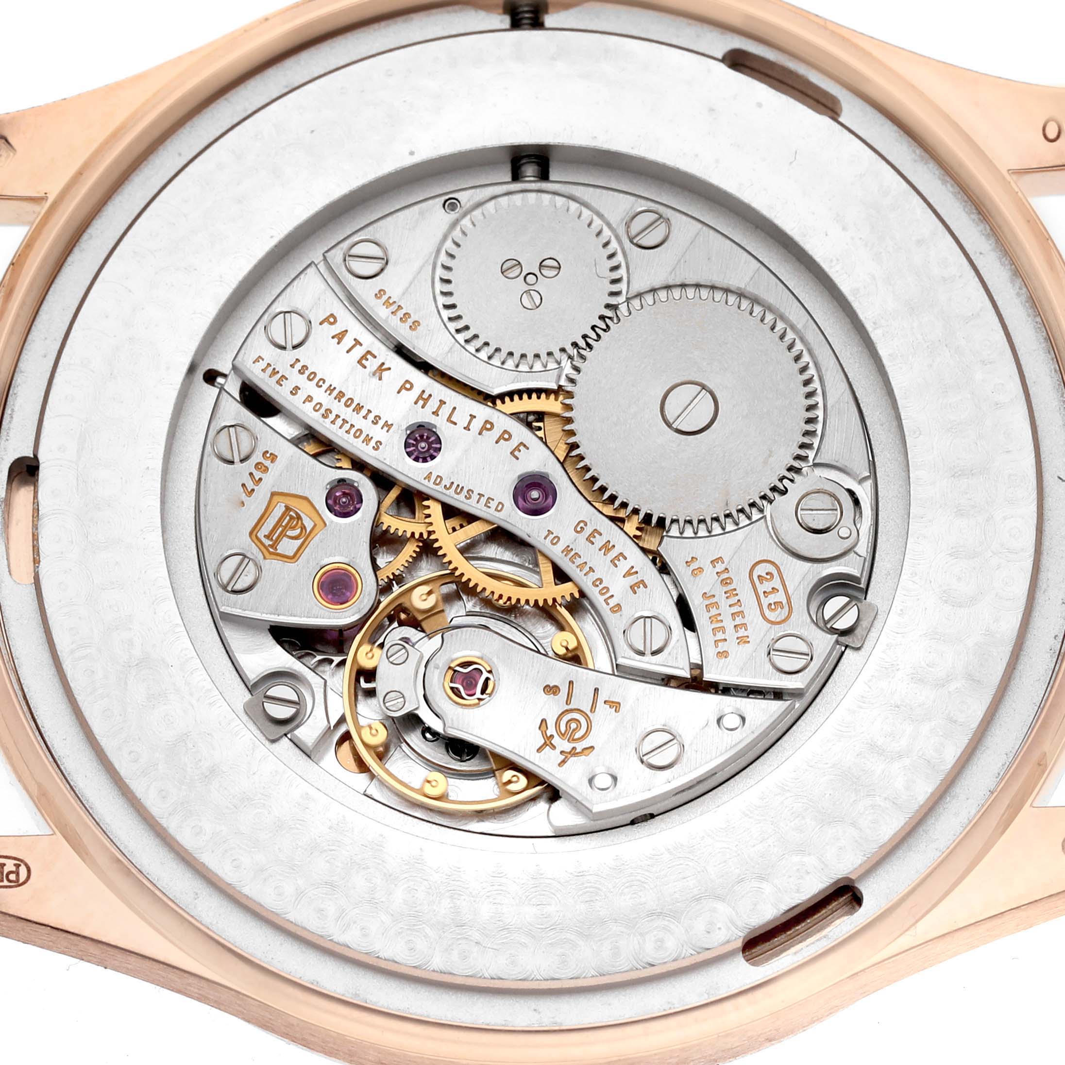 This image shows the back view of a Patek Philippe Calatrava 5196R Men
s Rose Gold Silver Dial 5196R Men
s Rose Gold Silver Dial watch, highlighting its mechanical movement.
