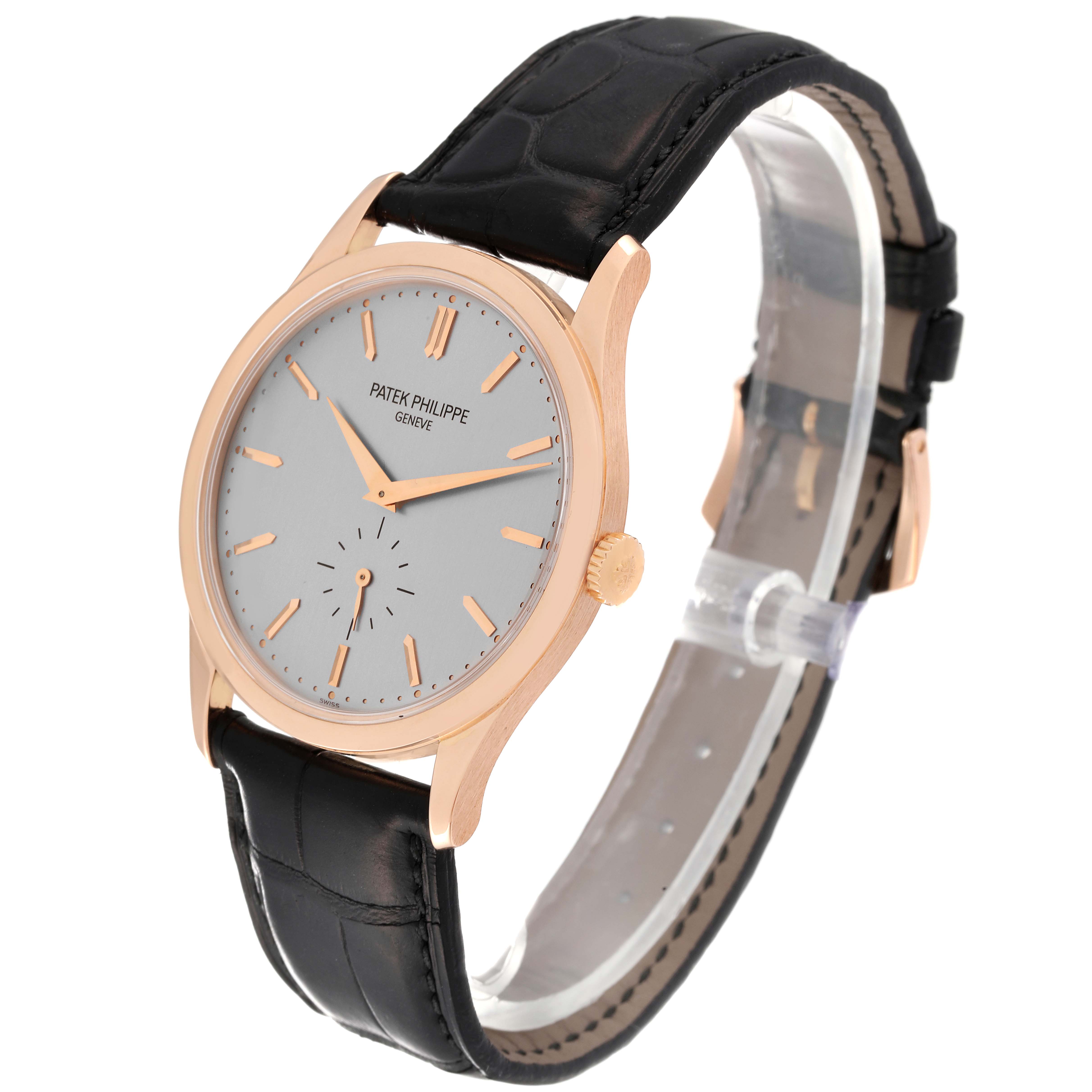 The image shows a Patek Philippe Calatrava 5196R Men
s Rose Gold Silver Dial 5196R Men
s Rose Gold Silver Dial watch from a front three-quarter angle, highlighting its dial, case, and strap.