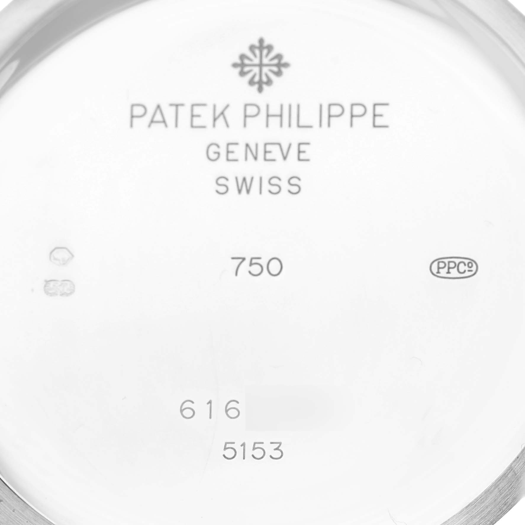 The image shows the inside case back of a Patek Philippe Calatrava 5153G-010 Men
s White Gold Silver Dial 5153G-010 Men
s White Gold Silver Dial, featuring branding and hallmark engravings.