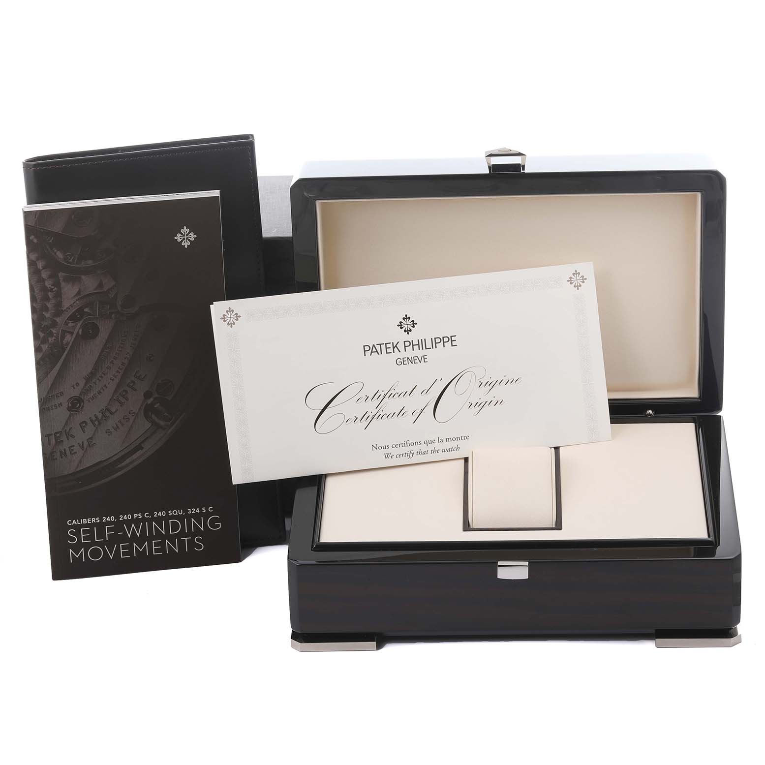 The image shows the Patek Philippe Calatrava 5153G-010 Men
s White Gold Silver Dial 5153G-010 Men
s White Gold Silver Dial
s packaging, including the box and certificate of origin, viewed from the front.