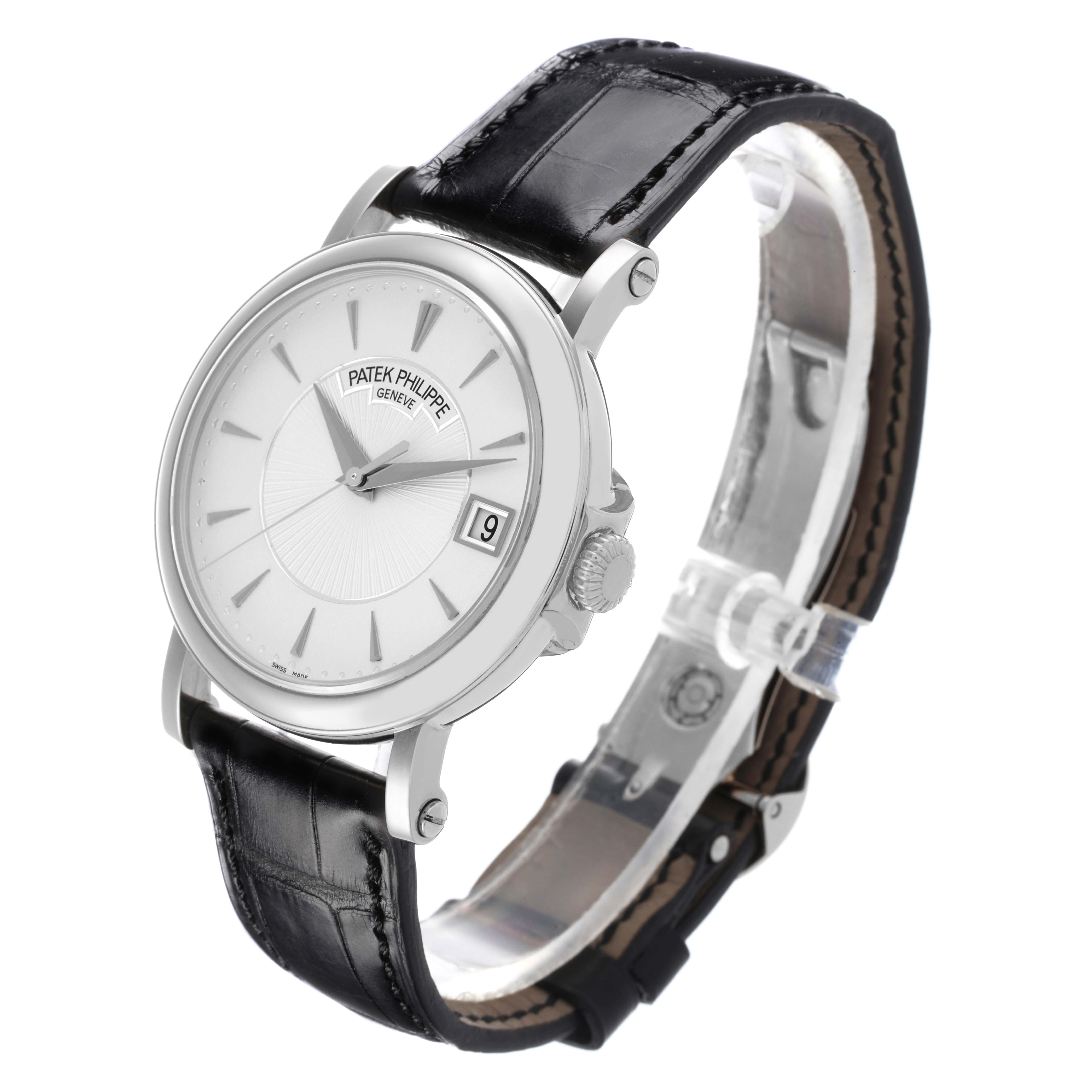The Patek Philippe Calatrava 5153G-010 Men
s White Gold Silver Dial 5153G-010 Men
s White Gold Silver Dial watch is shown at a three-quarter angle, highlighting the face, bezel, crown, and leather strap.