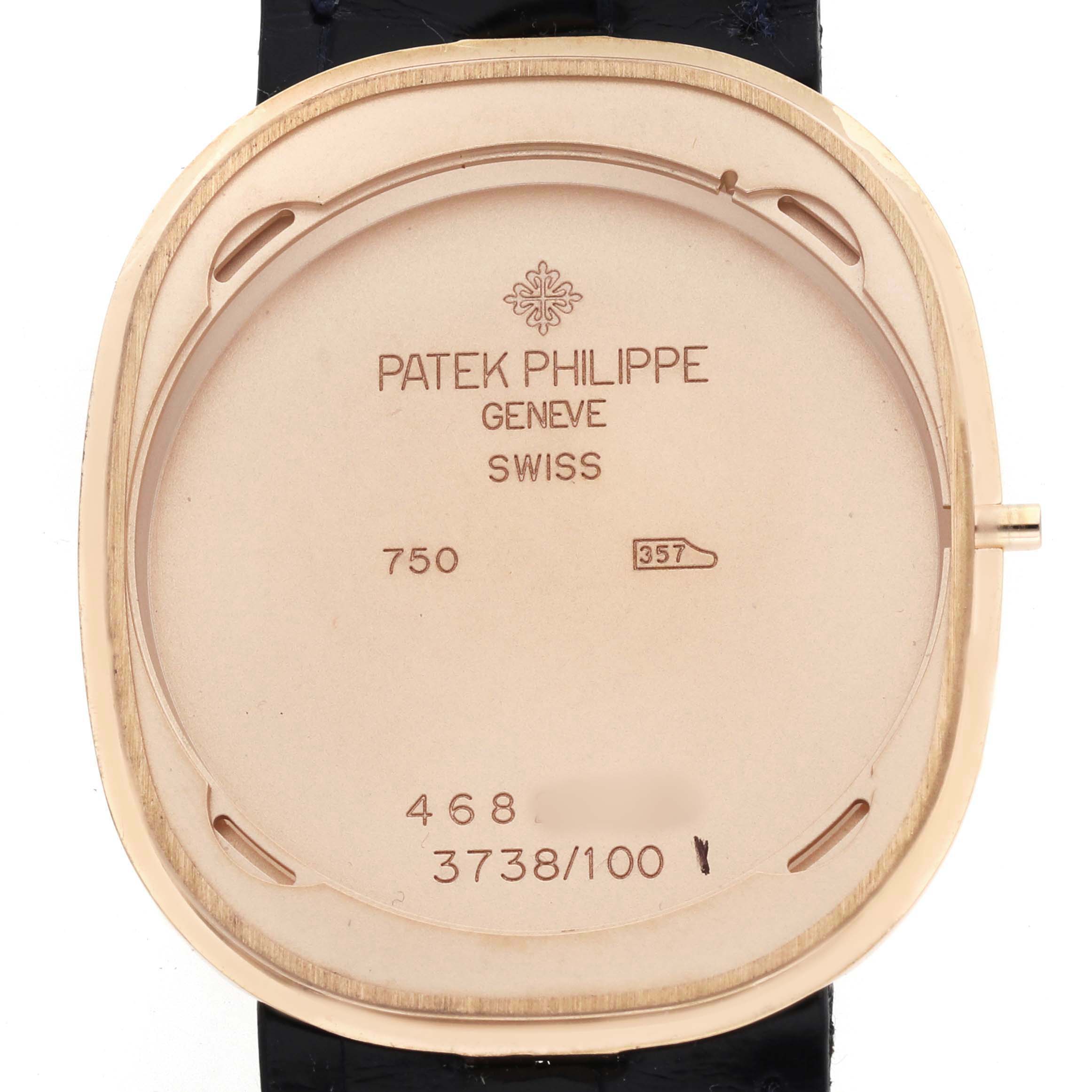 The image shows the back case of a Patek Philippe Golden Ellipse 3738 Men's Rose Gold Brown Dial watch, displaying inscriptions and markings.