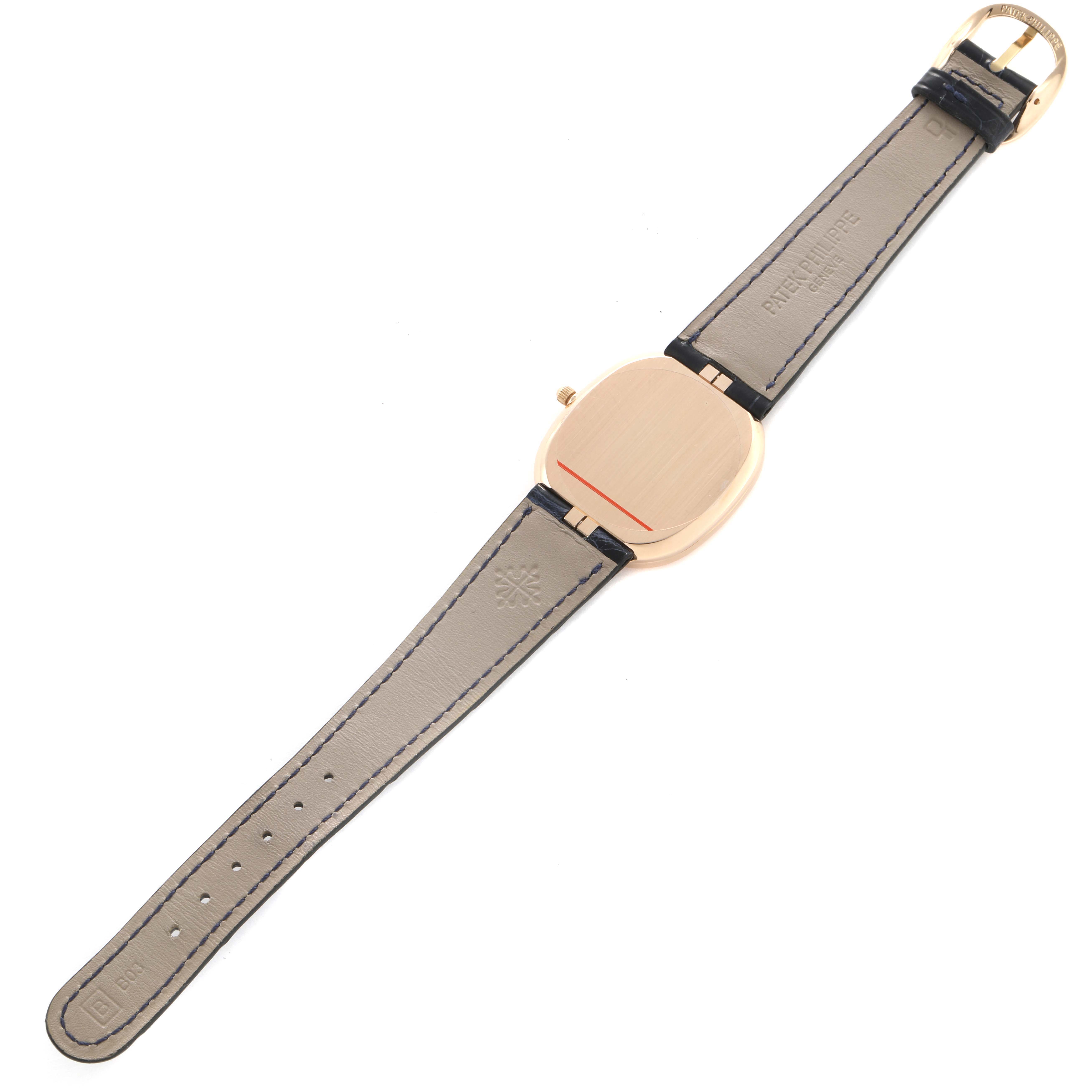 The image shows the back and strap of a Patek Philippe Golden Ellipse 3738 Men's Rose Gold Brown Dial watch lying flat.