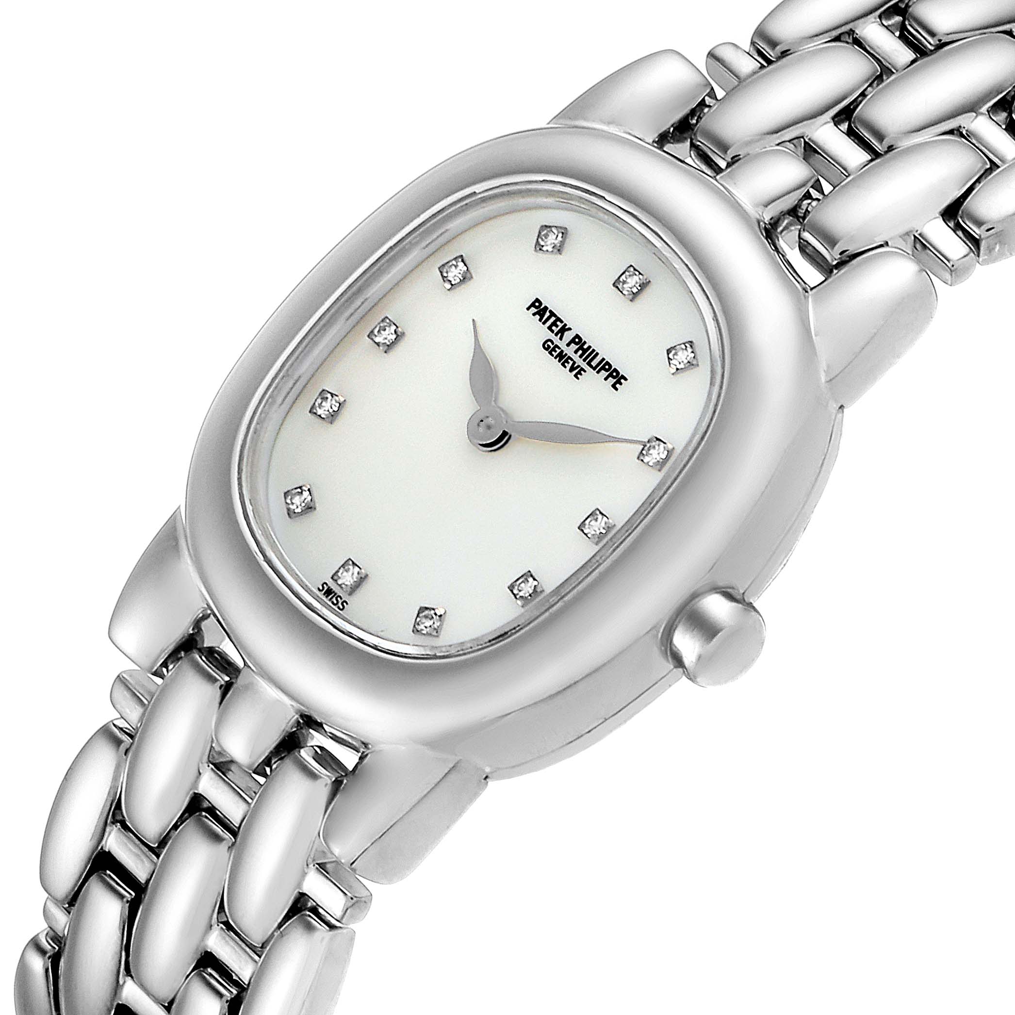 This image showcases a Patek Philippe Golden Ellipse 4830 Women's White Gold Mother of Pearl Dial 4830 Women's White Gold Mother of Pearl Dial watch from an angled view, highlighting the dial, case, bracelet, and crown.