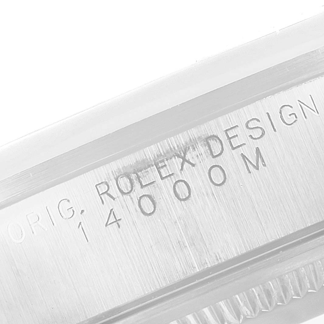 This close-up image shows the engraving on the case side of a Rolex Air-King 14000 Men's Stainless Steel White Dial 14000 Men's Stainless Steel White Dial watch.