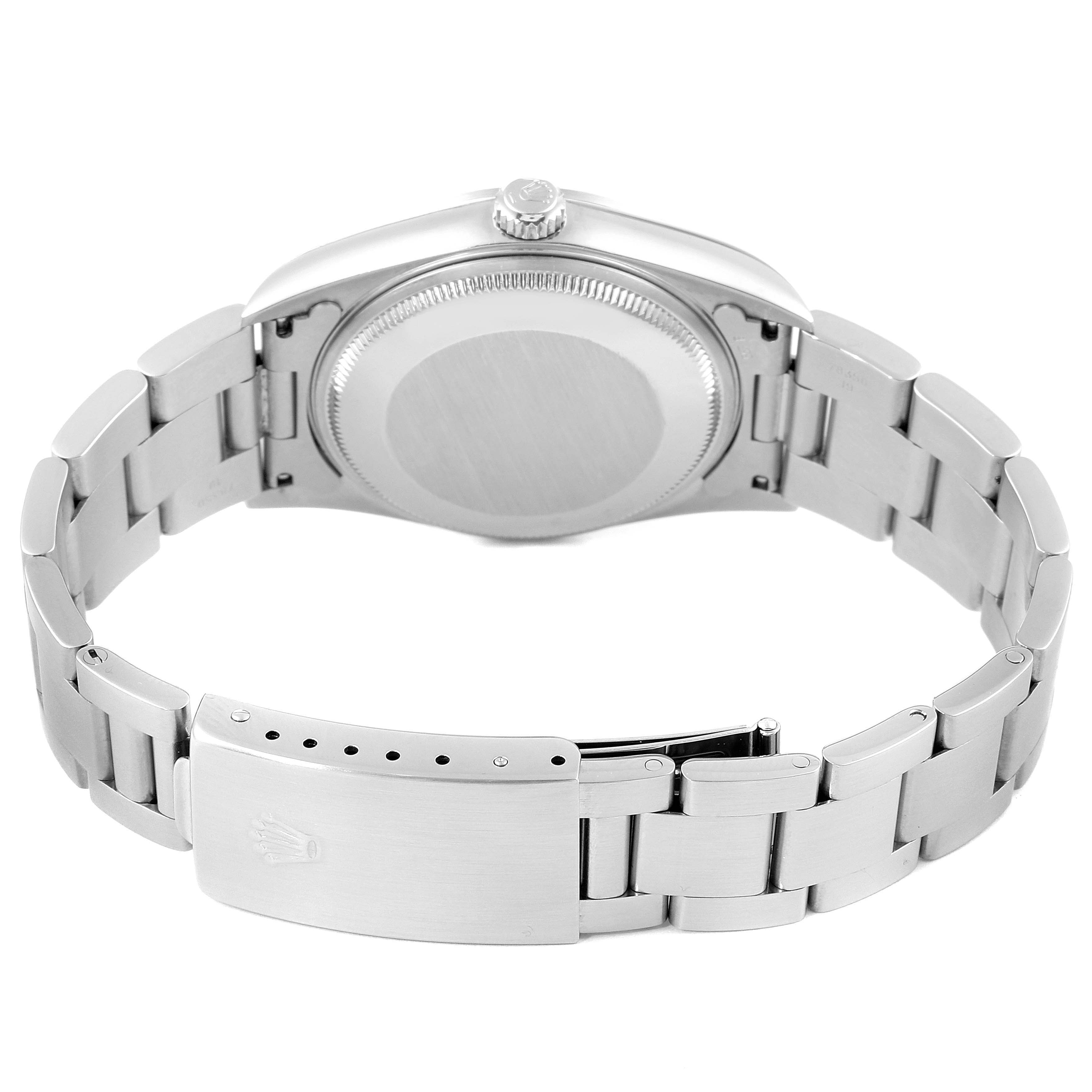 The image shows the back and clasp of a Rolex Air-King 14000 Men's Stainless Steel White Dial 14000 Men's Stainless Steel White Dial watch, highlighting its closed case back and metal bracelet.