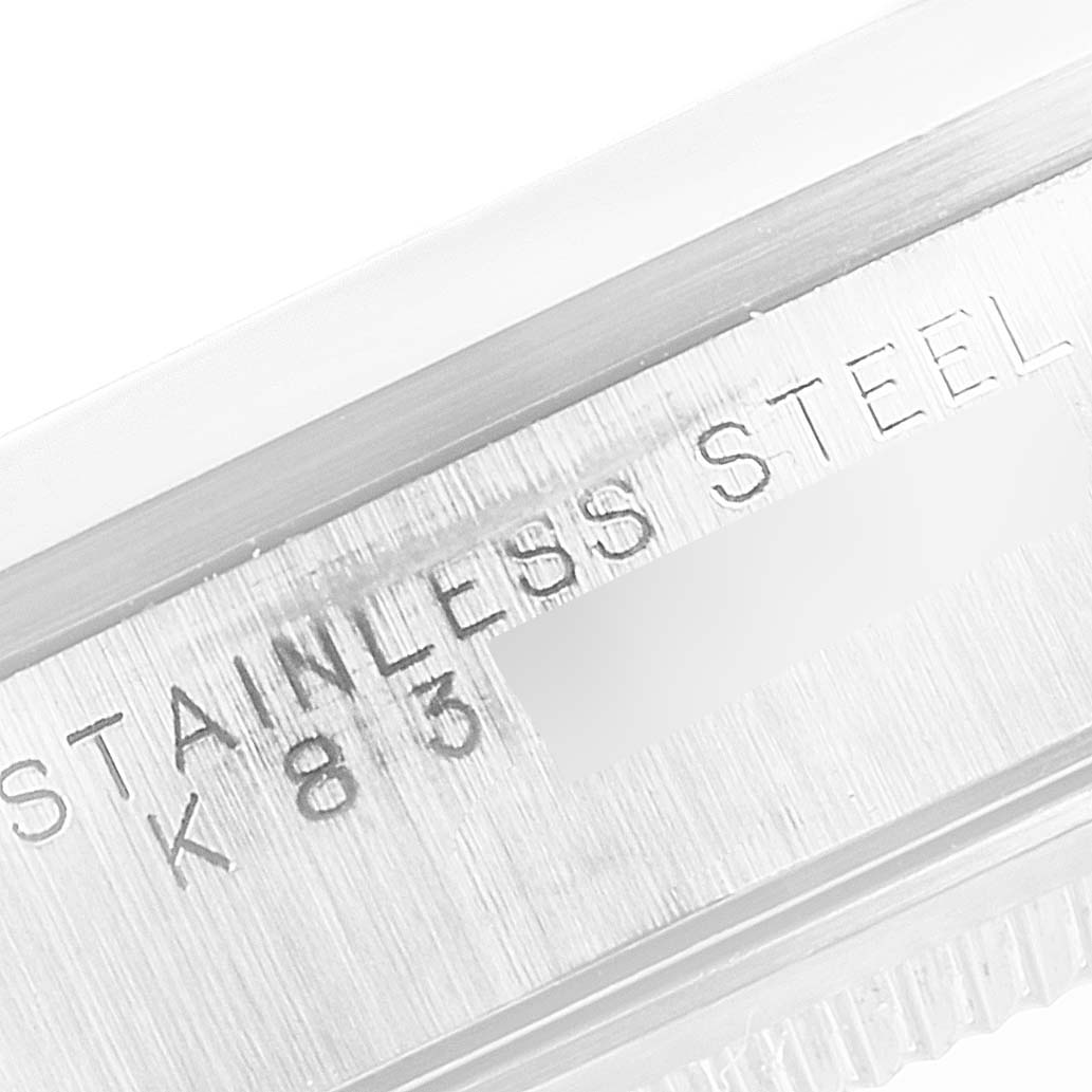 The image shows a close-up of the engravings on the stainless steel case of a Rolex Air-King 14000 Men's Stainless Steel White Dial 14000 Men's Stainless Steel White Dial watch.