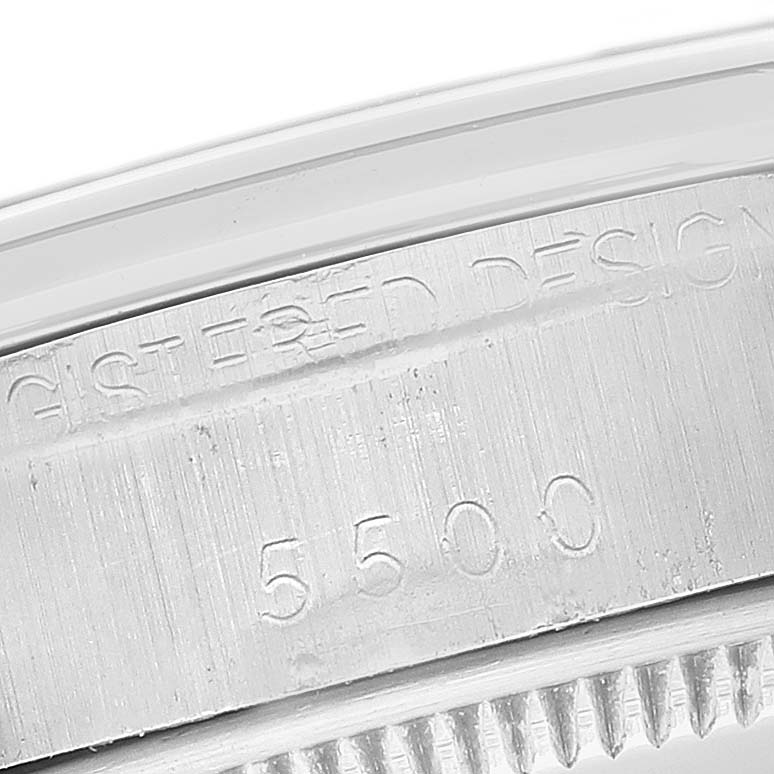 This image shows a close-up of the caseback and serial number engraving on a Vintage Collection Rolex watch, model 5500.