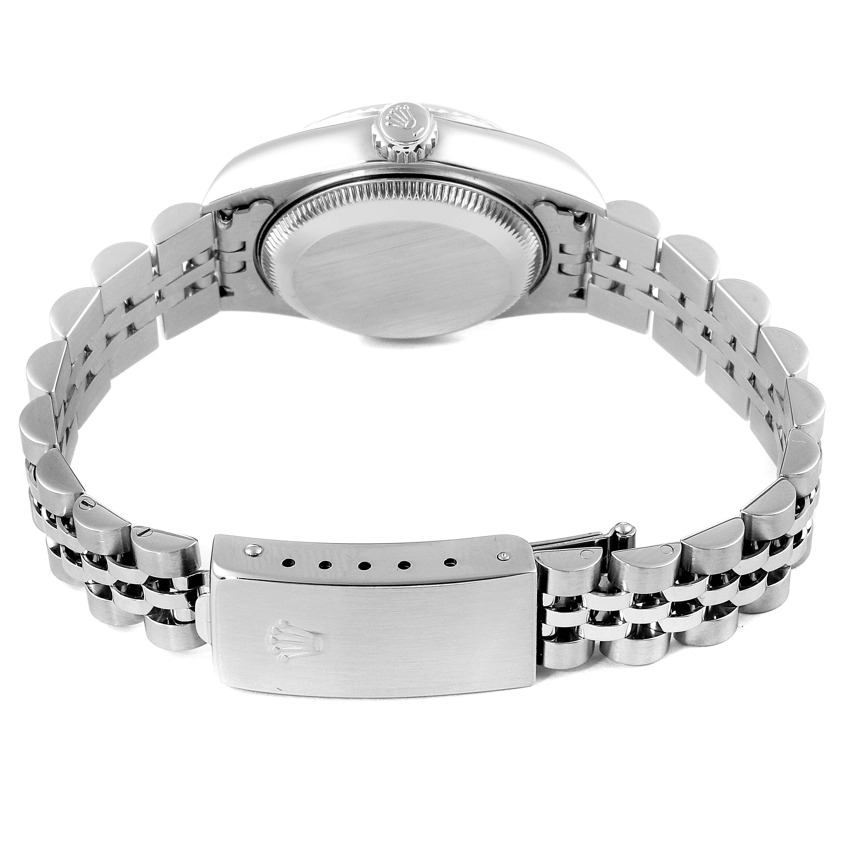 The image shows the Rolex Datejust 79174 Women's Stainless Steel Blue Dial 79174 Women's Stainless Steel Blue Dial watch from a rear angle, highlighting the case back, crown, and Jubilee bracelet with clasp.