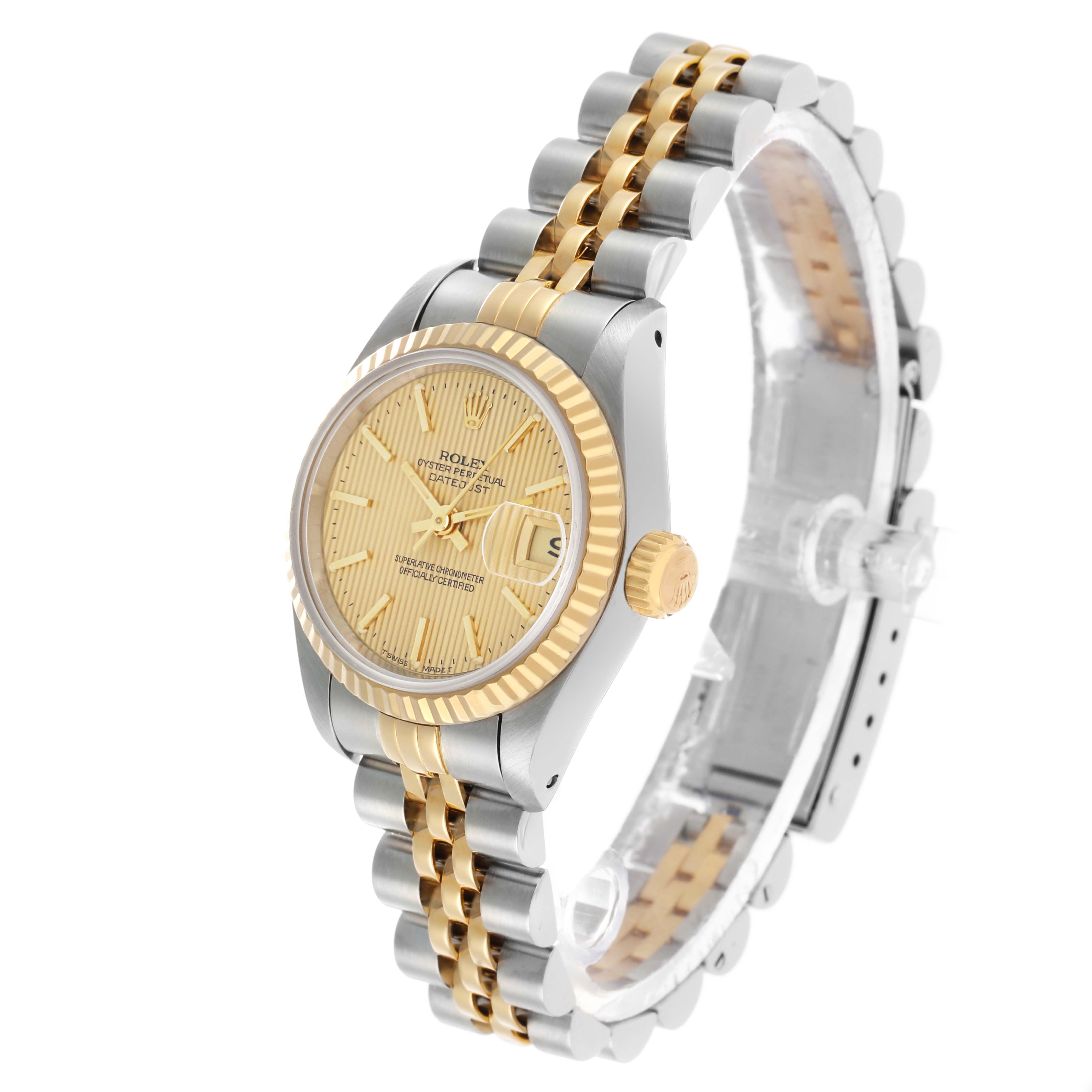 The Rolex Datejust 69173 Women's Steel and Gold (two tone) Champagne Dial watch is shown at a three-quarter angle highlighting the dial, fluted bezel, crown, and Jubilee bracelet.