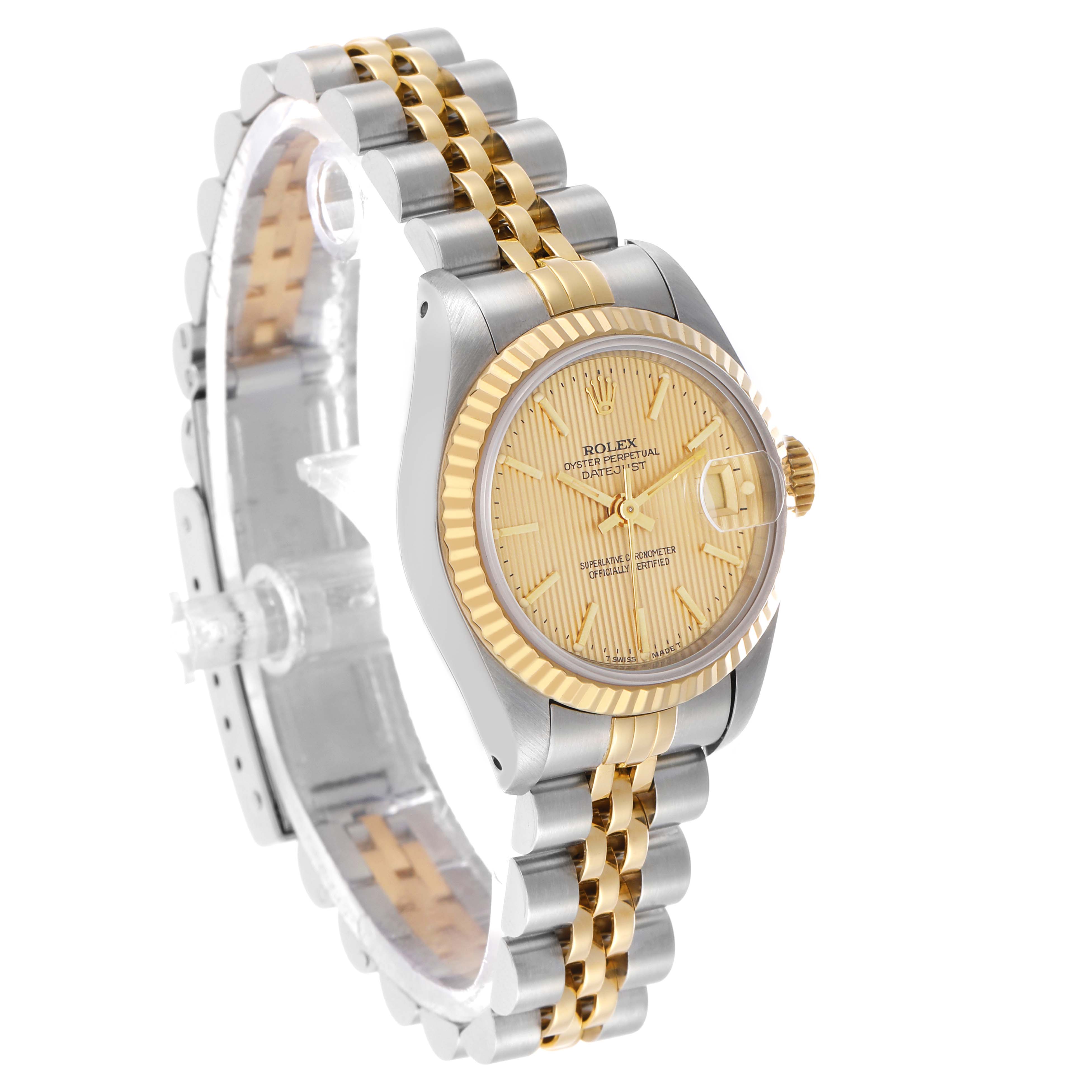 The Rolex Datejust 69173 Women's Steel and Gold (two tone) Champagne Dial watch is shown at an angled side view, highlighting its gold dial, fluted bezel, and two-tone bracelet.