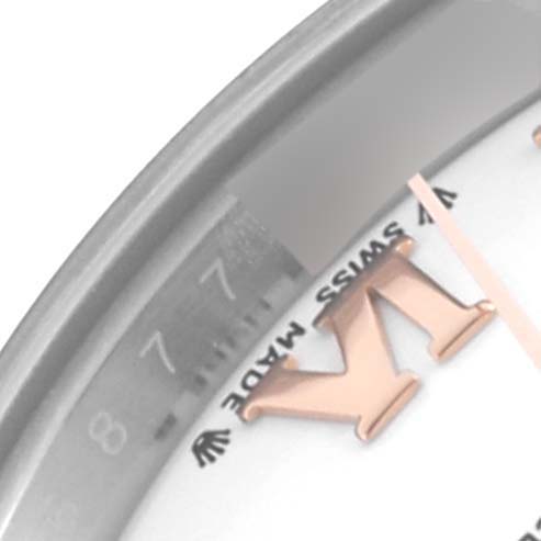 The image shows a partial close-up of the Rolex Datejust 279171 Women
s Steel and Gold (two tone) White Dial 279171 Women
s Steel and Gold (two tone) White Dial watch face, featuring the edge, bezel, and Roman numeral hour marker.