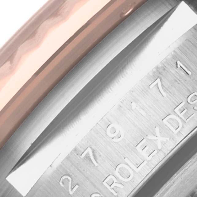 The image shows a close-up of the side of a Rolex Datejust 279171 Women
s Steel and Gold (two tone) White Dial 279171 Women
s Steel and Gold (two tone) White Dial watch, highlighting the brushed metal and engraved details.
