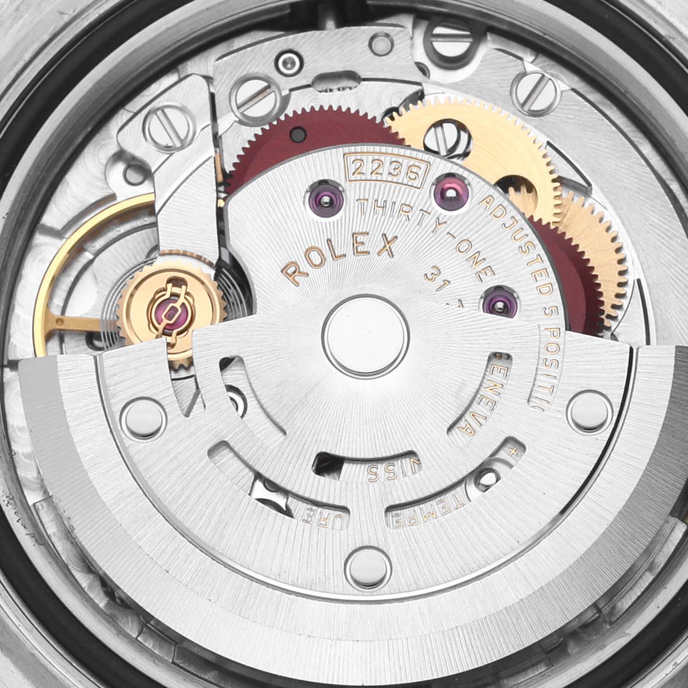 The image shows the movement of a Rolex Datejust 279171 Women
s Steel and Gold (two tone) White Dial 279171 Women
s Steel and Gold (two tone) White Dial watch from a top-down angle.