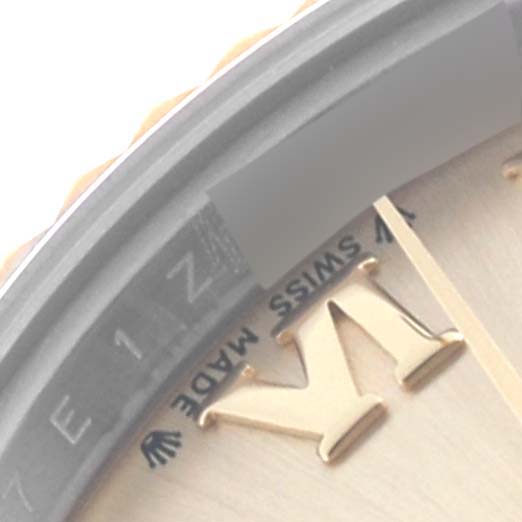 This image shows a close-up of the dial edge and the lettering on the Rolex Datejust 279173 Women's Steel and Gold (two tone) Champagne Dial 279173 Women's Steel and Gold (two tone) Champagne Dial watch face.