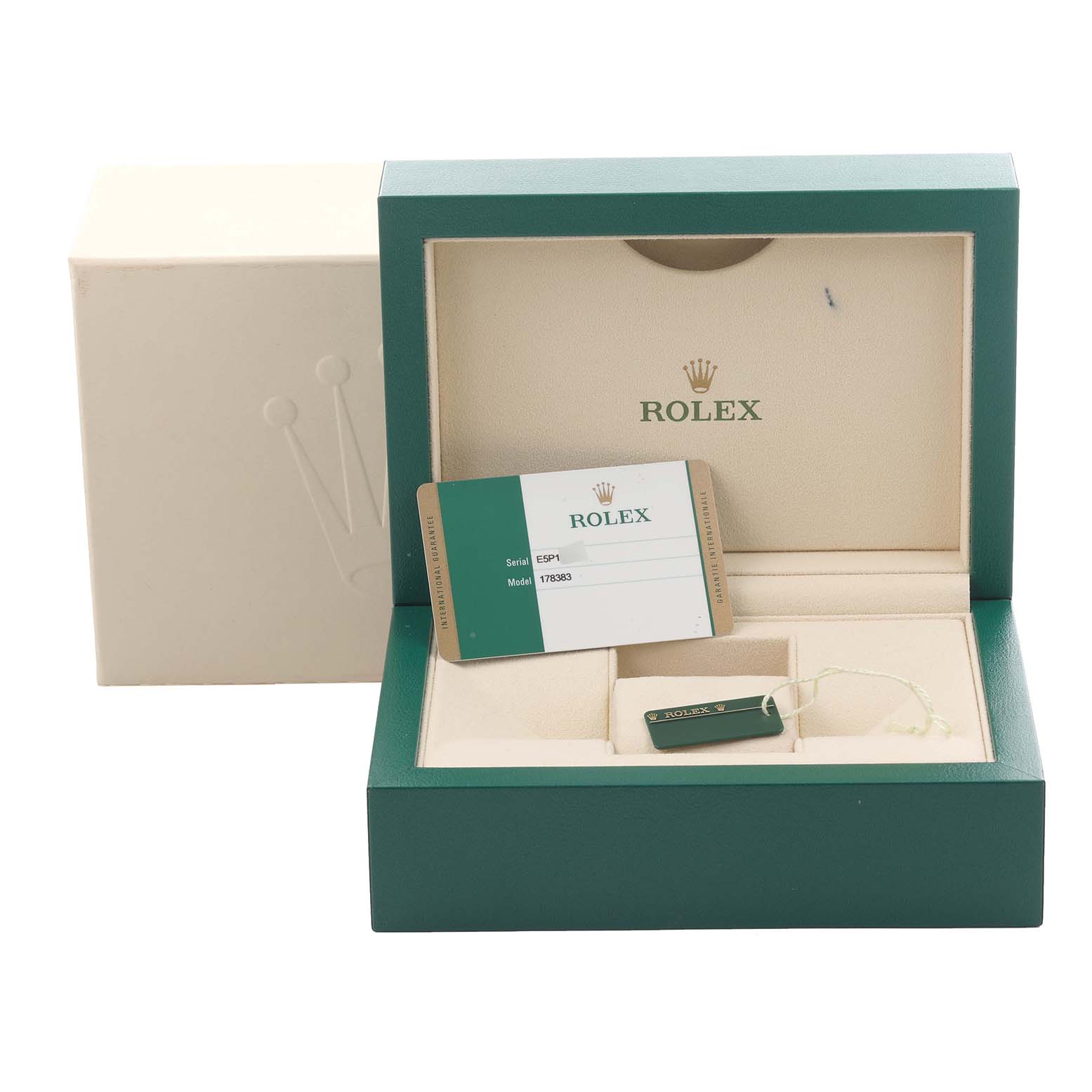 This image shows a Rolex box for the Mid-Size model, displaying the inner packaging, warranty card, and tag.