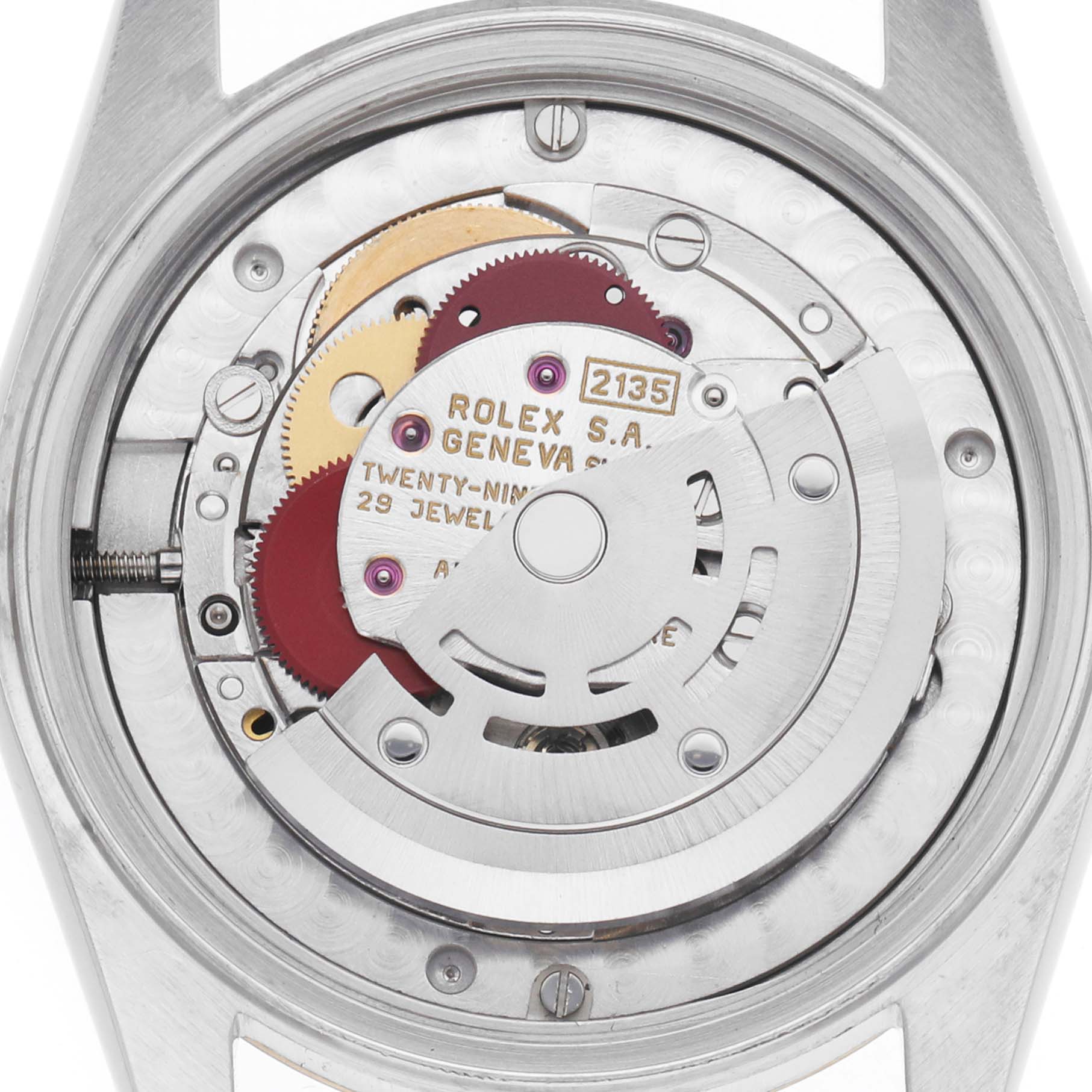 The image shows the movement of a Rolex Datejust 68273 Women's Steel and Gold (two tone) Champagne Dial watch from the back, highlighting gears and components inside the case.