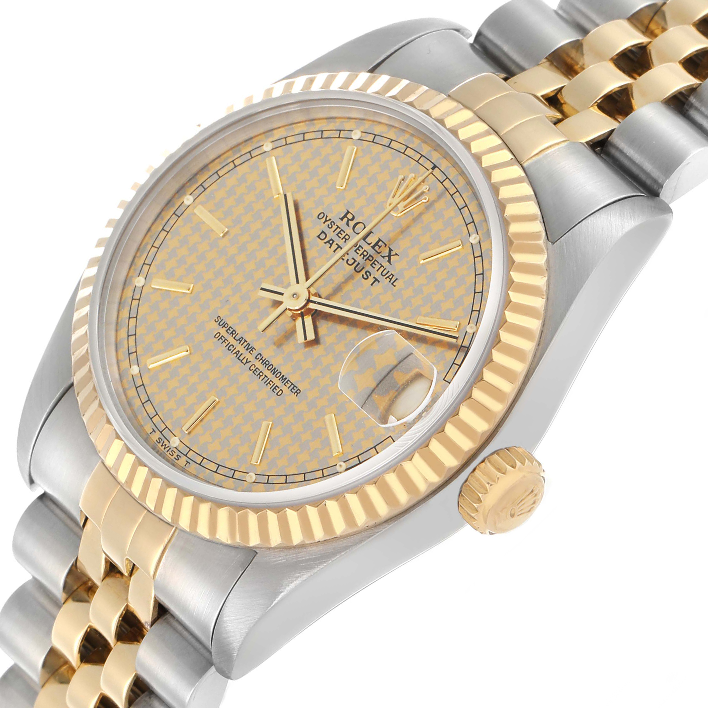 The Rolex Datejust 68273 Women's Steel and Gold (two tone) Champagne Dial watch is shown at an angle highlighting the dial, bezel, crown, and part of the bracelet.
