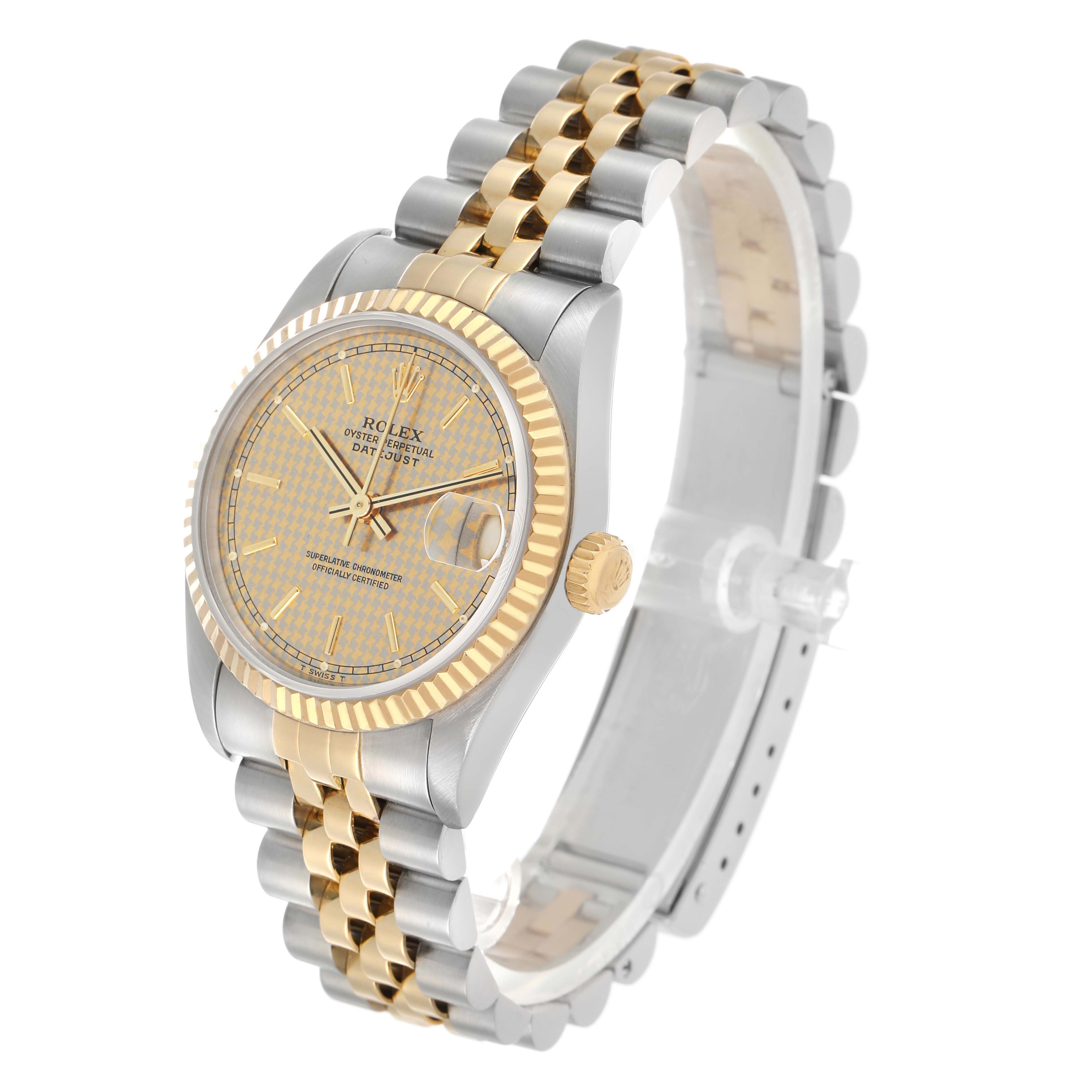 The Rolex Datejust 68273 Women's Steel and Gold (two tone) Champagne Dial watch is shown at a three-quarter angle, highlighting the dial, fluted bezel, crown, and jubilee bracelet.