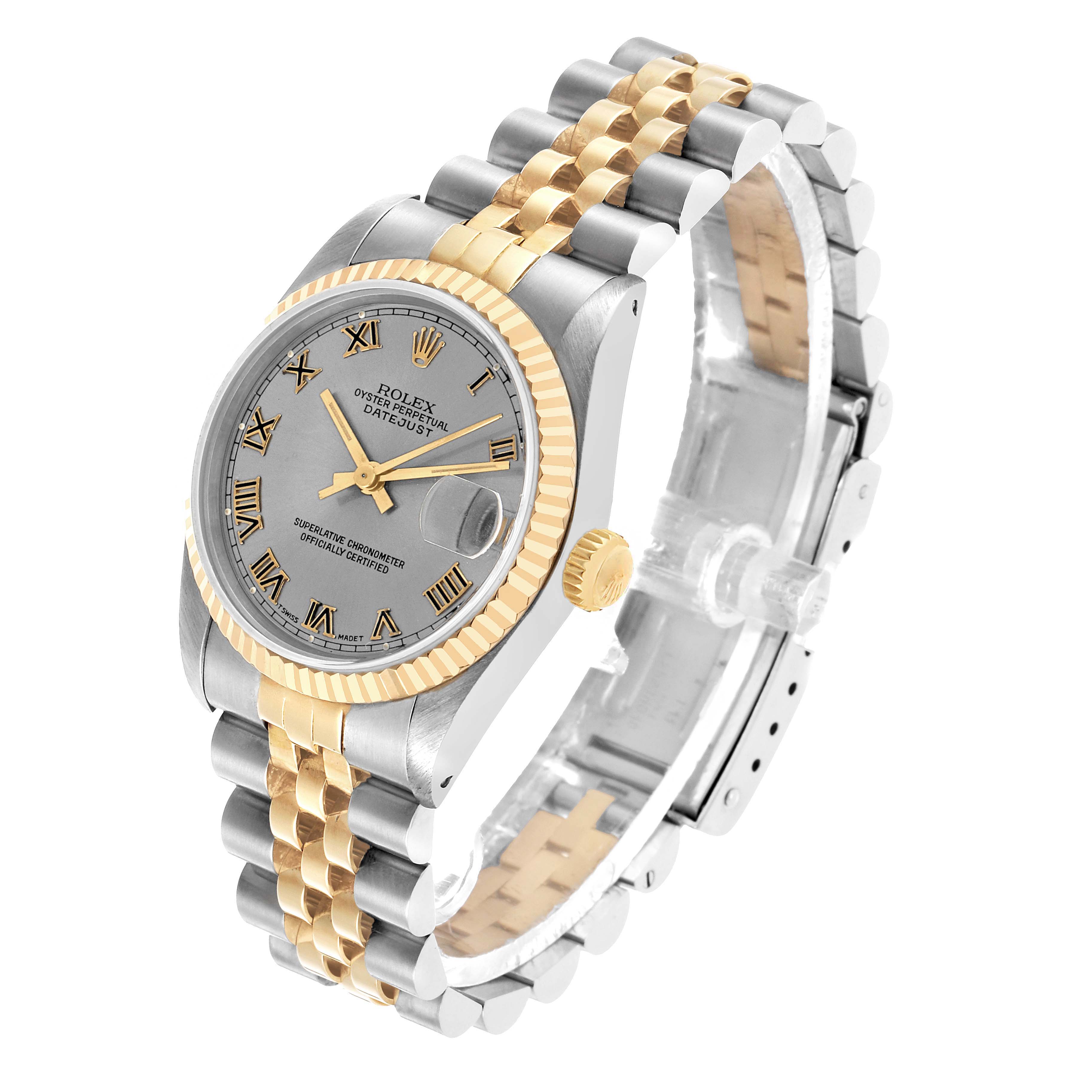 The Rolex Datejust 68273 Women's Steel and Gold (two tone) Grey Dial watch is shown at a three-quarter angle, highlighting the dial, bezel, and two-tone bracelet.