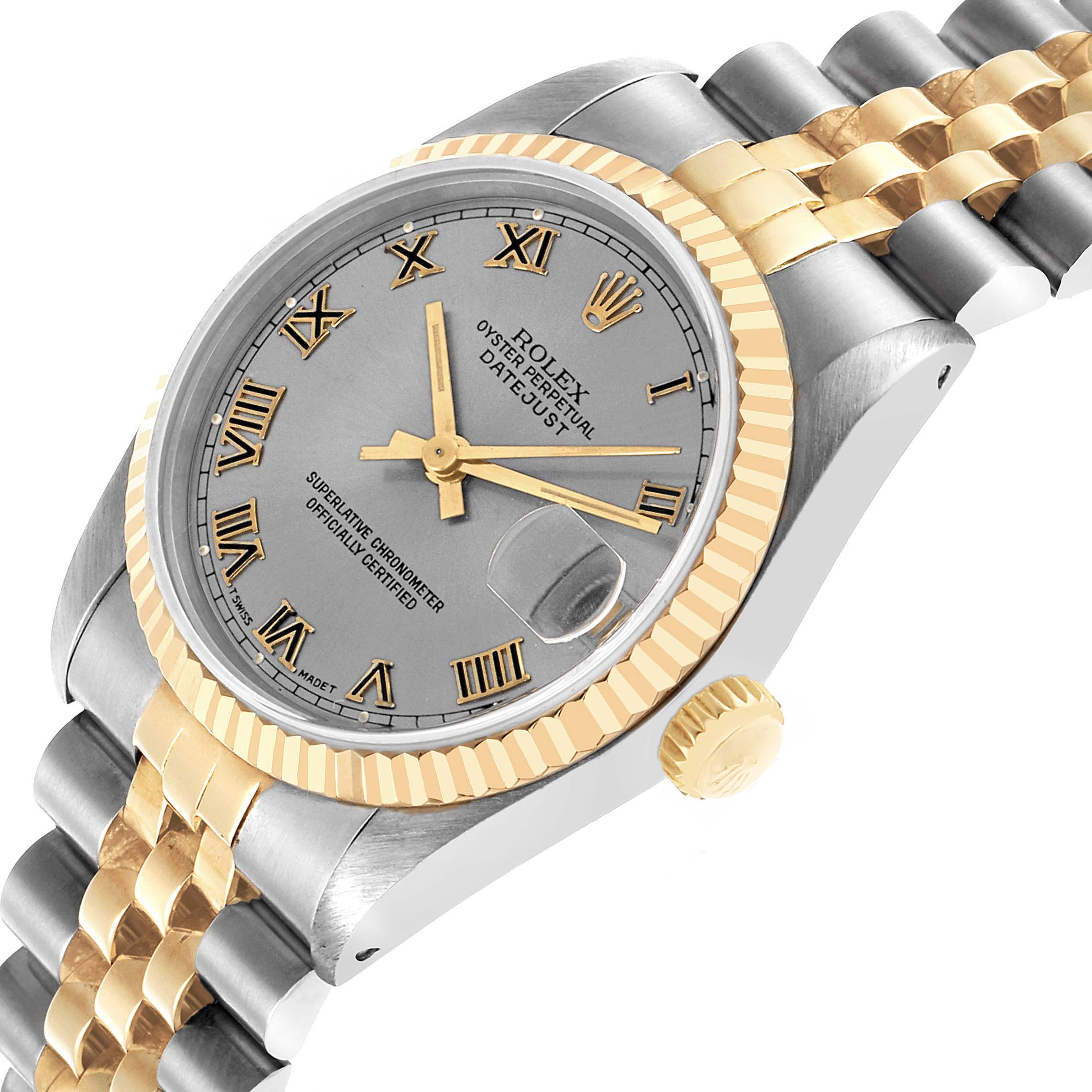The Rolex Datejust 68273 Women's Steel and Gold (two tone) Grey Dial is shown at an angle highlighting the face, bezel, and bracelet.