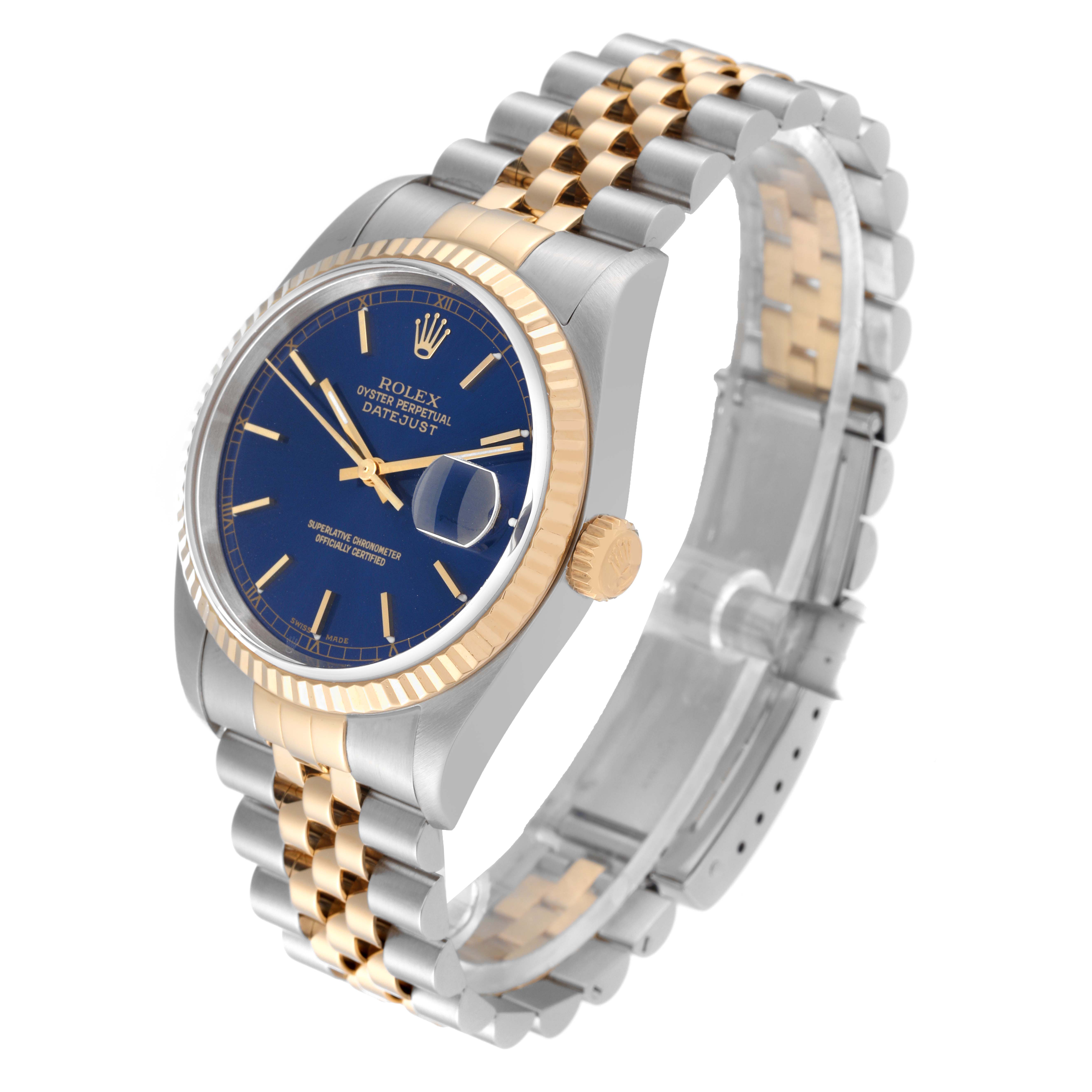 The Rolex Datejust 16233 Men's Steel and Gold (two tone) Blue Dial 16233 Men's Steel and Gold (two tone) Blue Dial watch is shown at a three-quarter angle, highlighting its bezel, blue dial, crown, and two-tone bracelet.