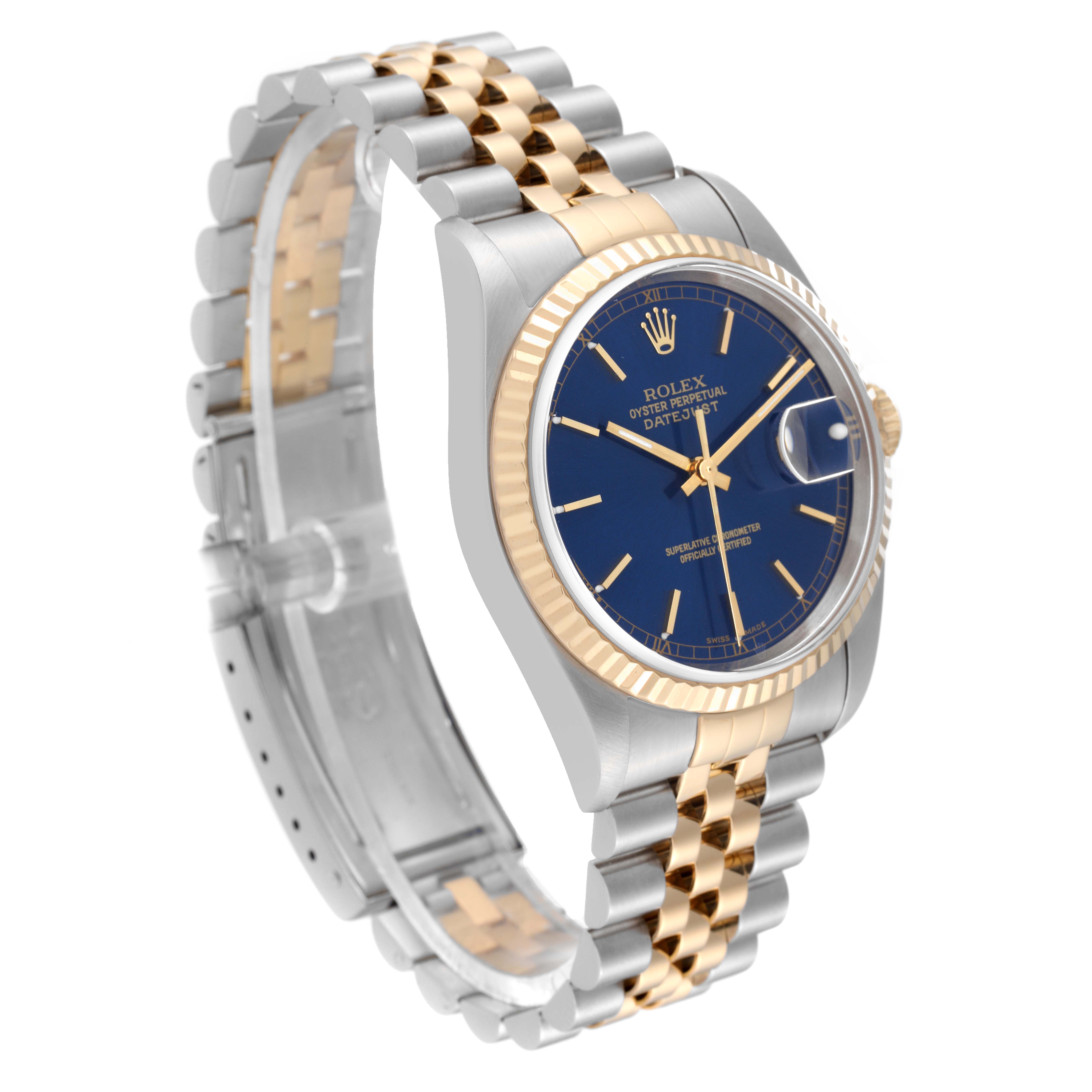 The image shows a Rolex Datejust 16233 Men's Steel and Gold (two tone) Blue Dial 16233 Men's Steel and Gold (two tone) Blue Dial watch from an angled side view, featuring its blue dial, fluted gold bezel, and two-tone bracelet.