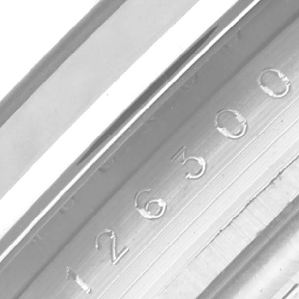 The image shows a close-up of the inner bezel with engravings of the Rolex Datejust 41 126300 Men's Stainless Steel Blue Dial 126300 Men's Stainless Steel Blue Dial.