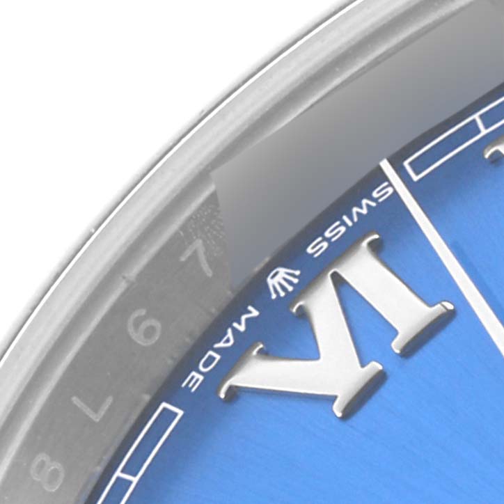 The Rolex Datejust 41 126300 Men's Stainless Steel Blue Dial 126300 Men's Stainless Steel Blue Dial watch image shows a close-up of the blue dial, partial numerals, and "SWISS MADE" text.