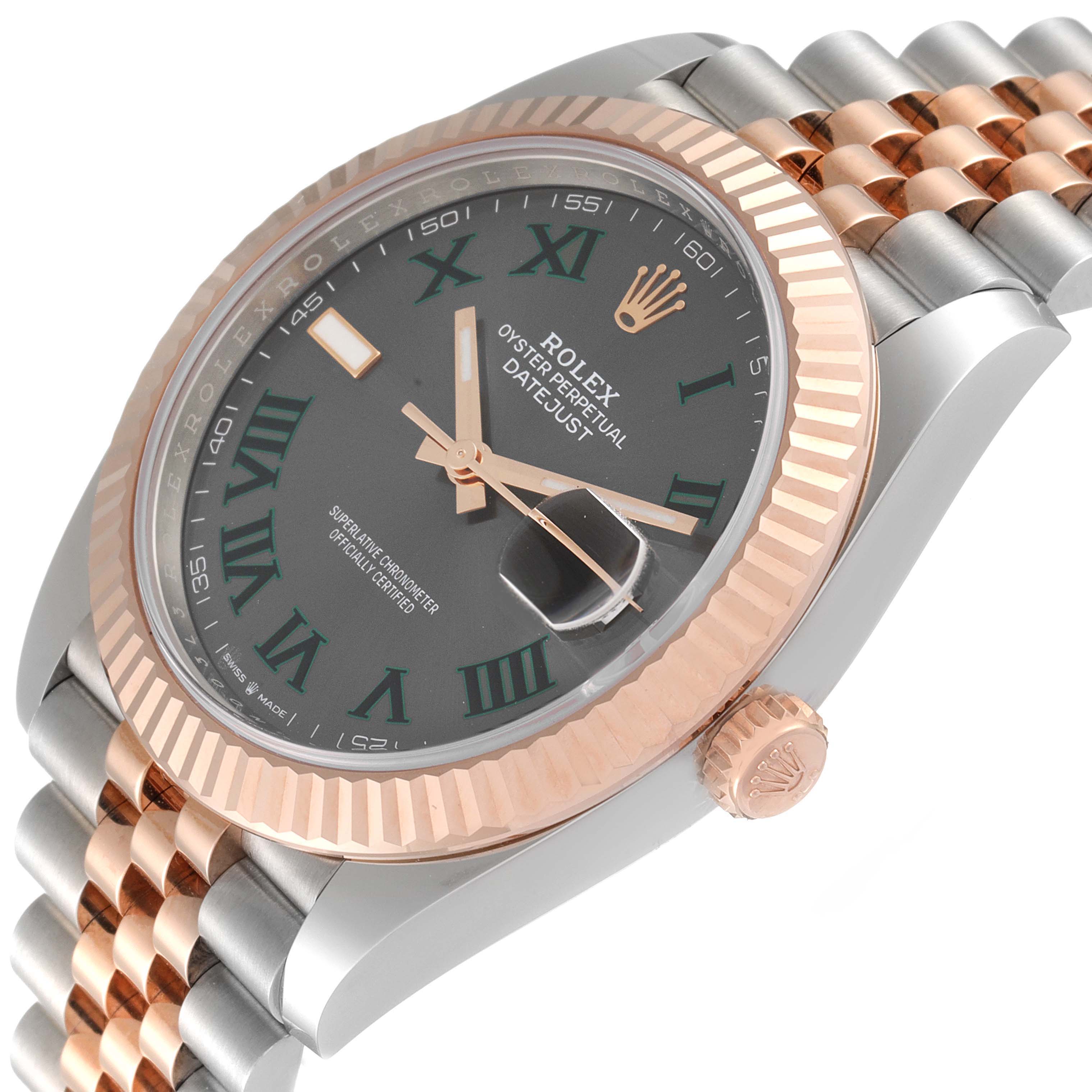 The image shows a side angle of the Rolex Datejust 41 126331 Men's Rose Gold Grey Dial 126331 Men's Rose Gold Grey Dial, highlighting its fluted bezel, crown, and part of the bracelet.