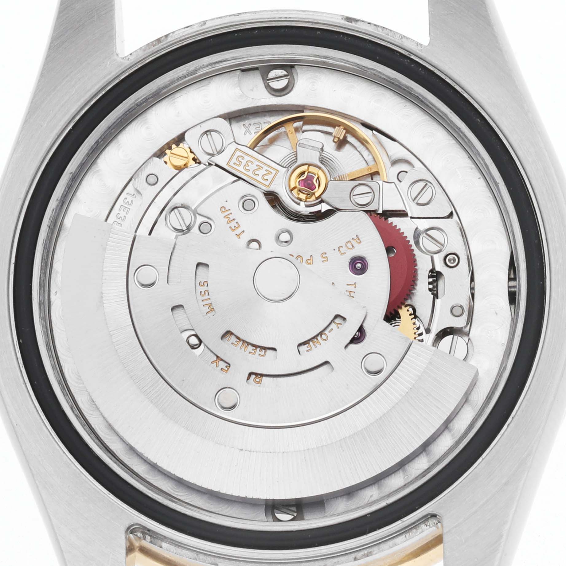 The image shows the movement of a Rolex Datejust 178383 Women's Steel and Gold (two tone) Silver Dial watch from a top-down angle, displaying its intricate inner mechanics.