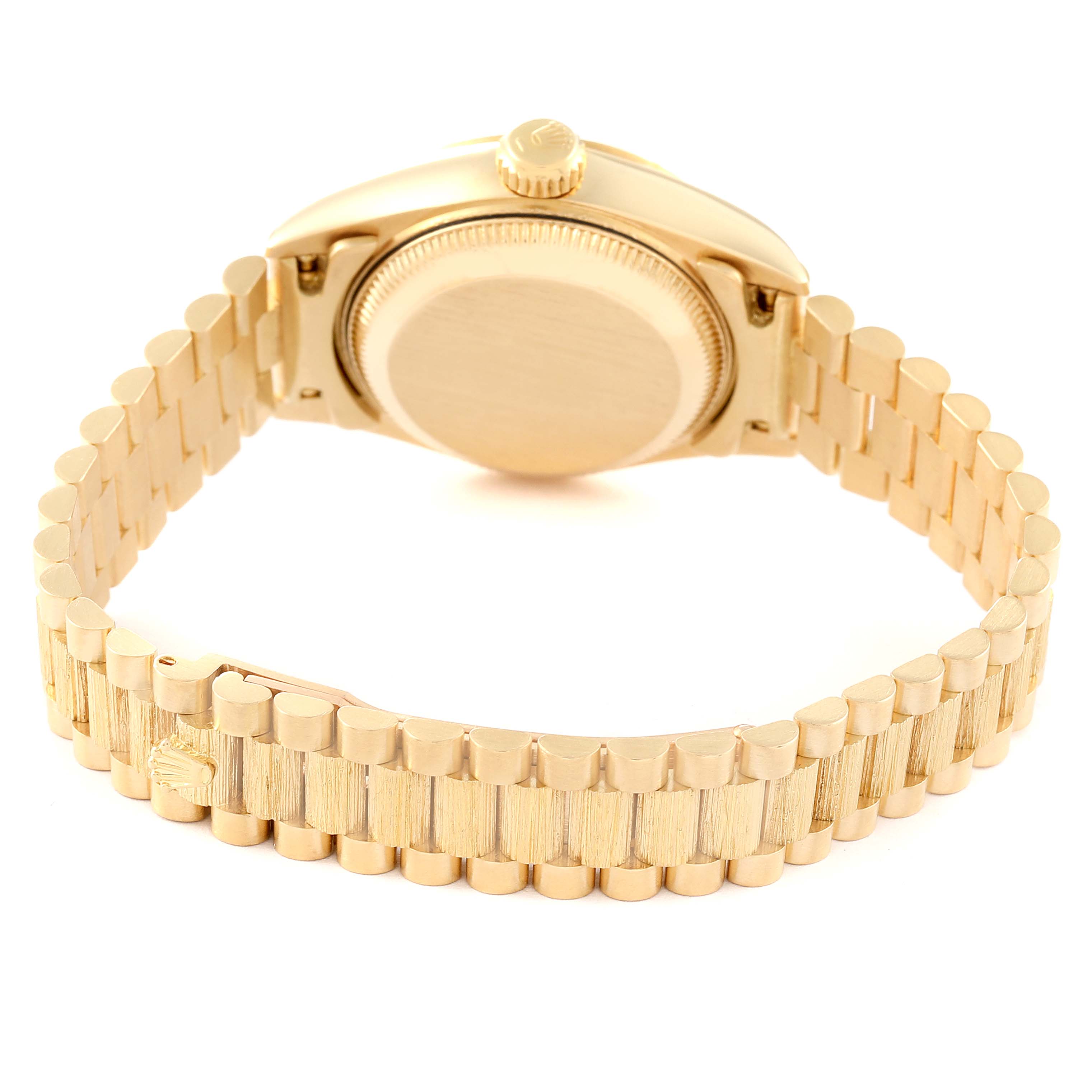 This image shows the back view of a Rolex President 69278 Women's Yellow Gold Champagne Dial 69278 Women's Yellow Gold Champagne Dial model watch, highlighting the case back and bracelet.