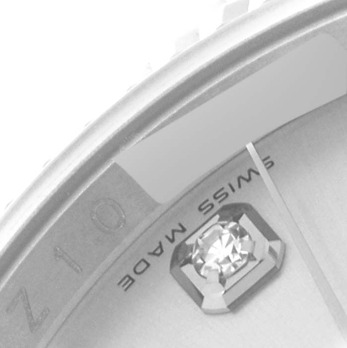 This close-up angle shows a section of the dial and bezel of the Rolex Datejust 116234 Men's Stainless Steel Silver Dial 116234 Men's Stainless Steel Silver Dial, including a diamond marker and part of the "Swiss Made" text.