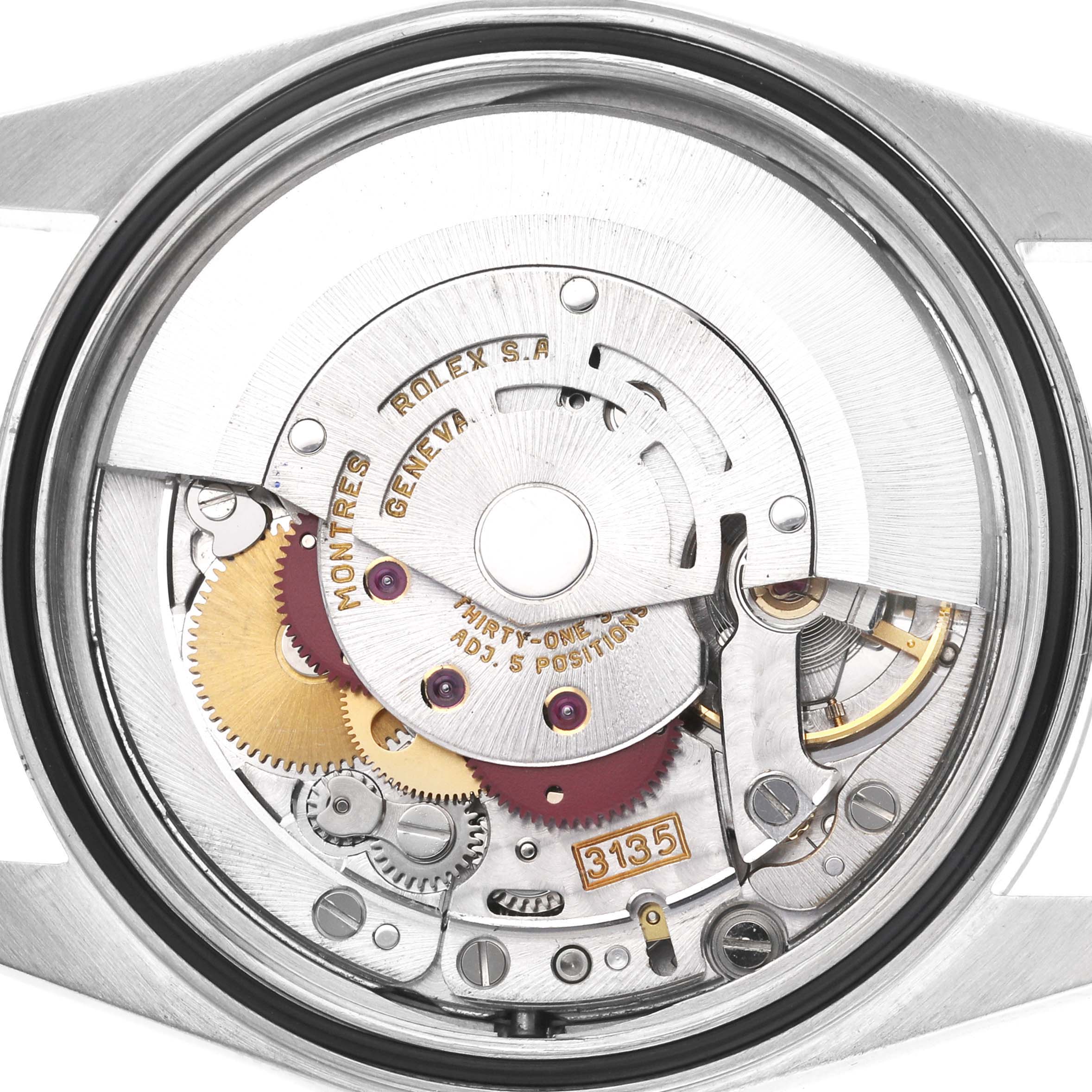 The image shows the back view of a Rolex Datejust 16234 Men
s Stainless Steel Silver Dial 16234 Men
s Stainless Steel Silver Dial
s movement, highlighting its mechanical components.