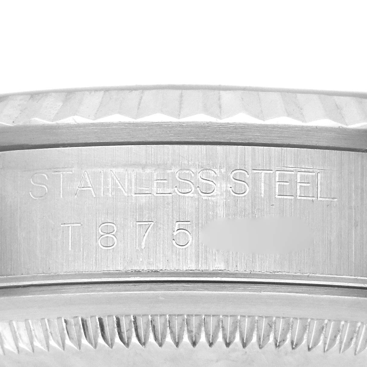 The image shows a close-up of the side engraving on the stainless steel case of a Rolex Datejust 16234 Men
s Stainless Steel Silver Dial 16234 Men
s Stainless Steel Silver Dial watch.