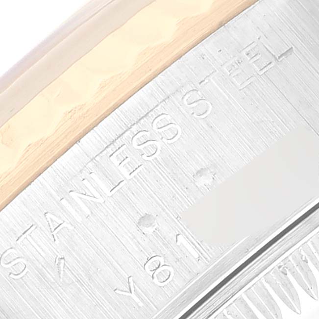 The image shows a close-up angle of the engraved text "Stainless Steel" on a Rolex Datejust 79173 Women's Steel and Gold (two tone) Black Dial 79173 Women's Steel and Gold (two tone) Black Dial watch case.