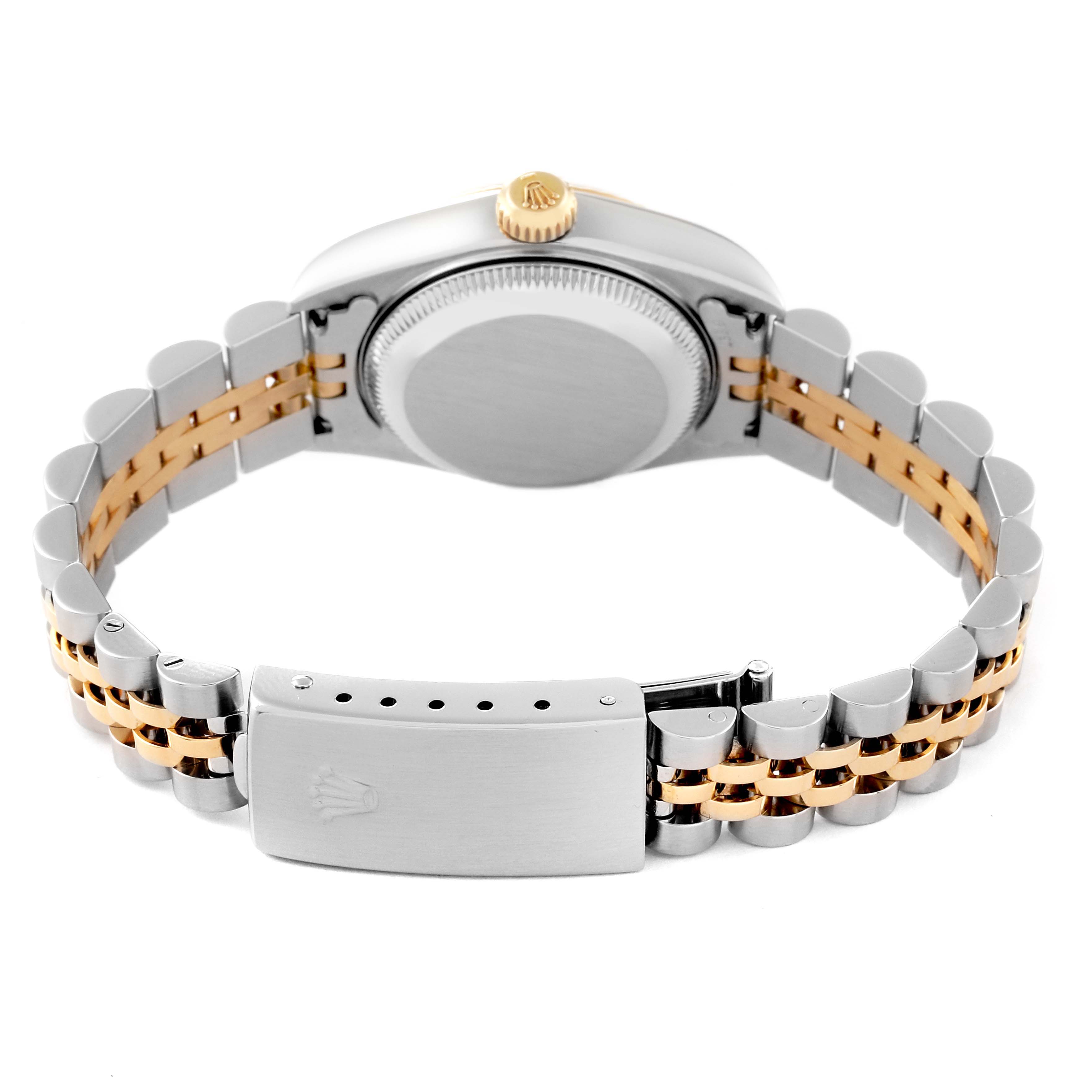 This image shows the back view of a Rolex Datejust 79173 Women's Steel and Gold (two tone) White Dial 79173 Women's Steel and Gold (two tone) White Dial watch, highlighting its two-tone bracelet and clasp.
