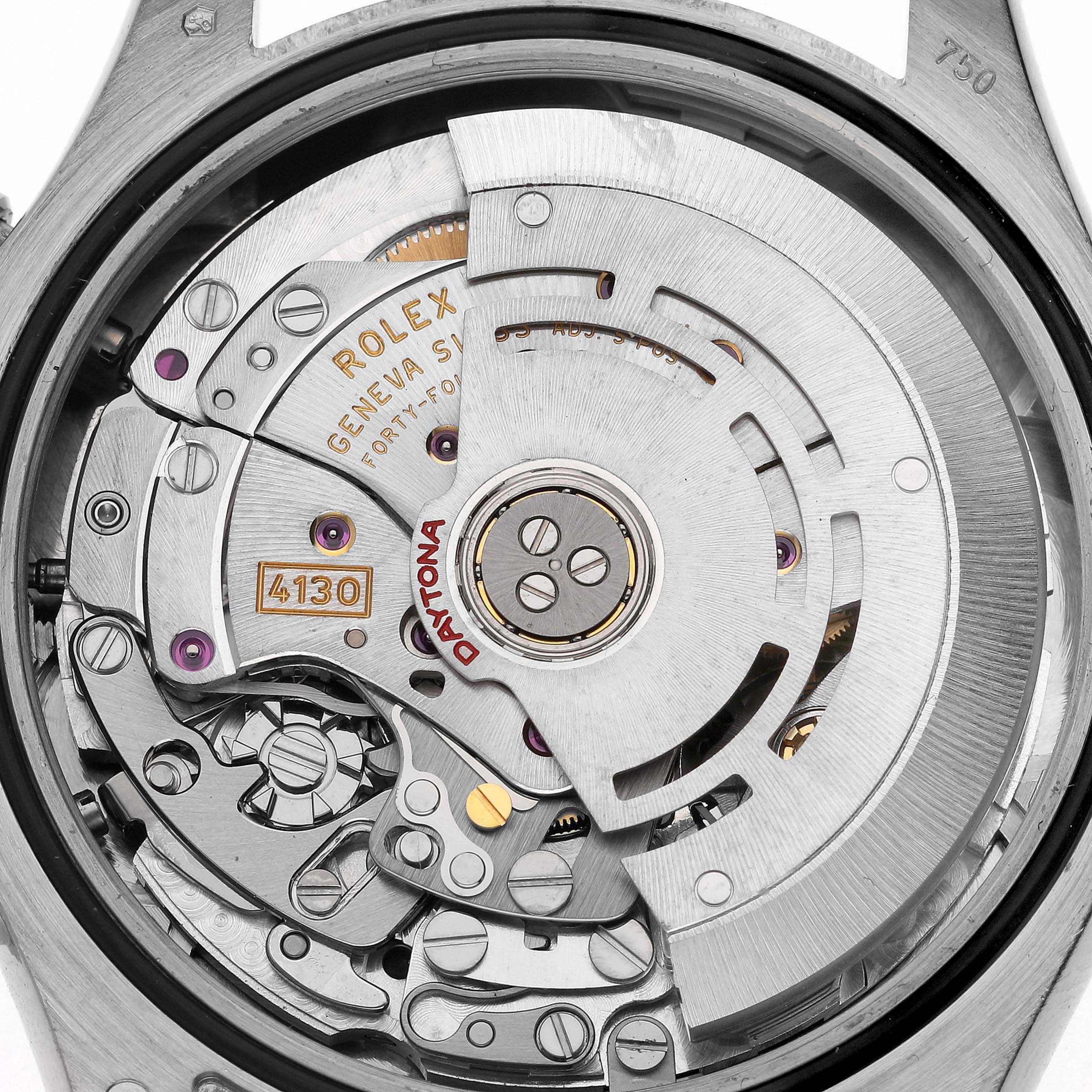 The image shows the Rolex Daytona 116509 Men's White Gold White Dial 116509 Men's White Gold White Dial watch movement from a back angle, highlighting the intricate mechanics and engravings.