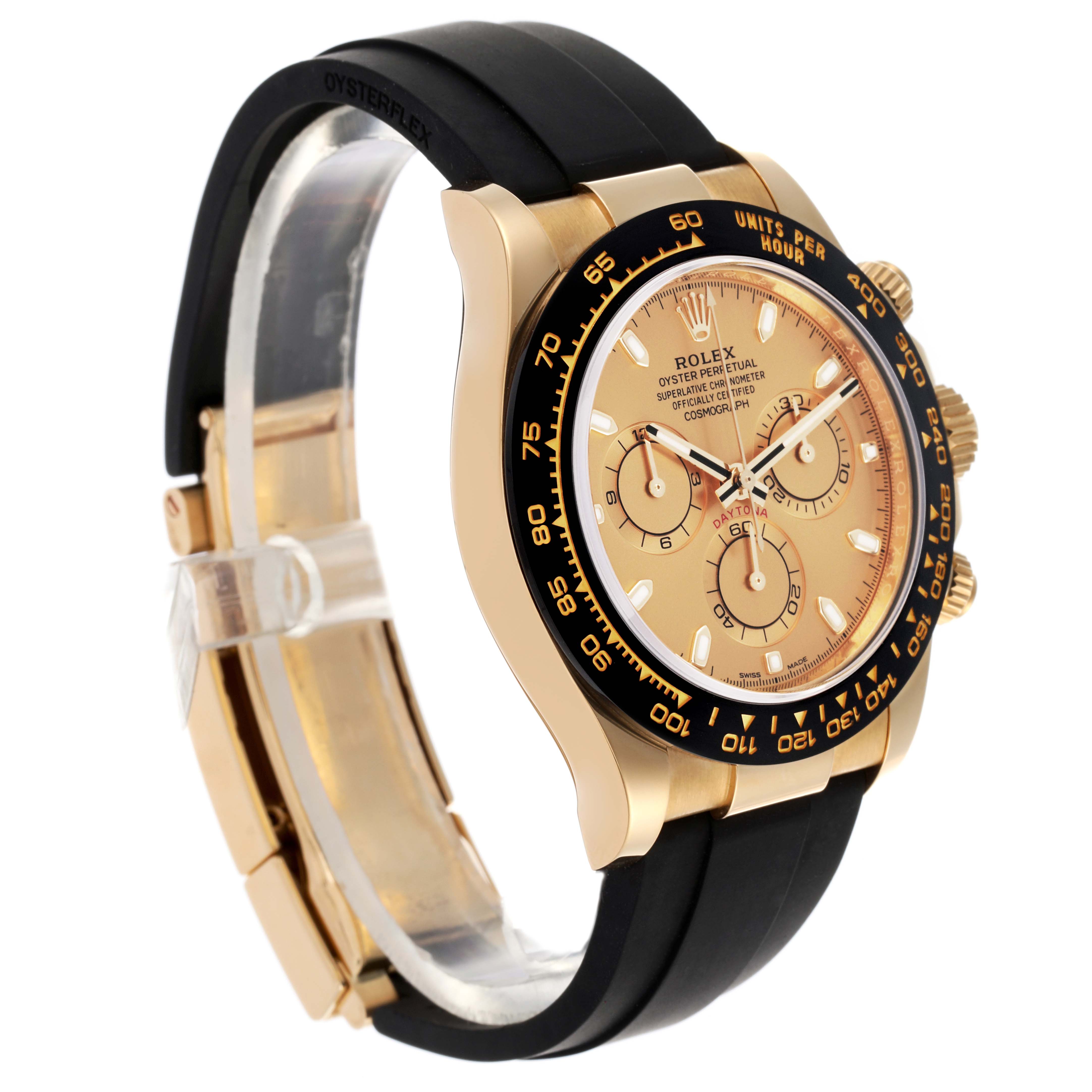 The image shows a side angle of a Rolex Daytona 116518LN Men's Yellow Gold Champagne Dial 116518LN Men's Yellow Gold Champagne Dial, featuring the bezel, dial, crown, and rubber strap.